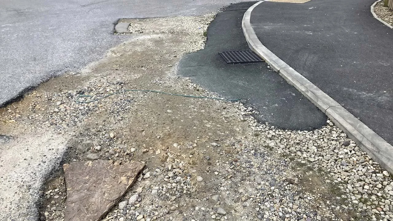 LMW Development Solutions Leaves Featherstone Homeowners with Unfinished Roads Two Years On