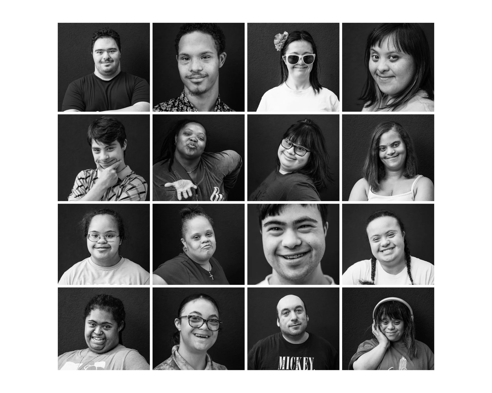 Black and white headshot of a GiGi's Playhouse NYC participant with down syndrome against a gray wall