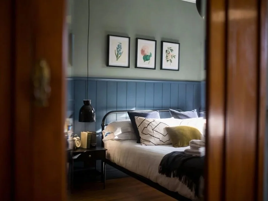Holiday home interior design in Anglesey by Stiwdio Interior Design, blending traditional character with a nature-inspired palette reflecting the surrounding countryside.