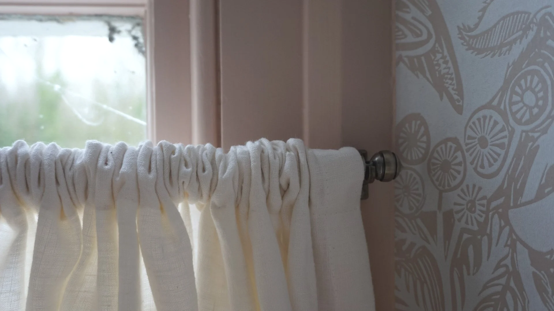 Anglesey country house refurbishment featuring bespoke window dressings cafe curtain in linen, soft neutral tones and heritage detailing by Stiwdio Interior Design, North Wales.