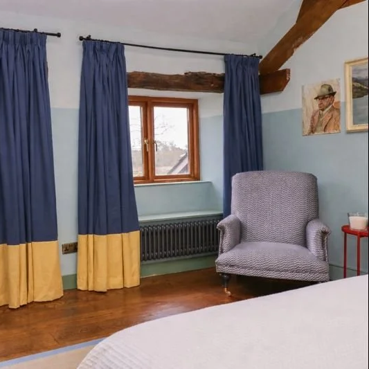 Two Tone bedroom curtains bottom stripe in period property in lake district