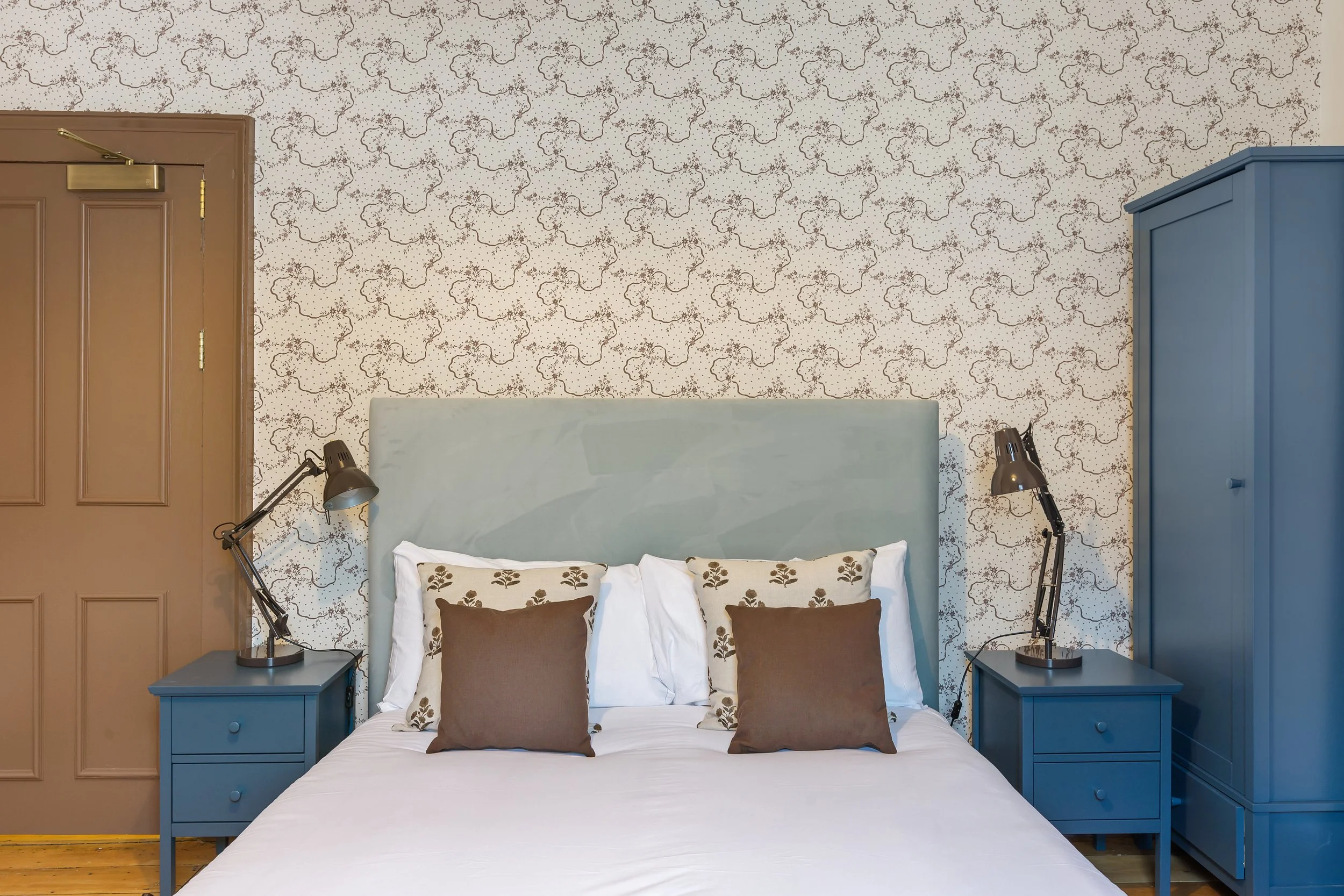 Heritage bedroom renovation in Liverpool featuring restored period details, bespoke joinery and North Wales inspired tones.