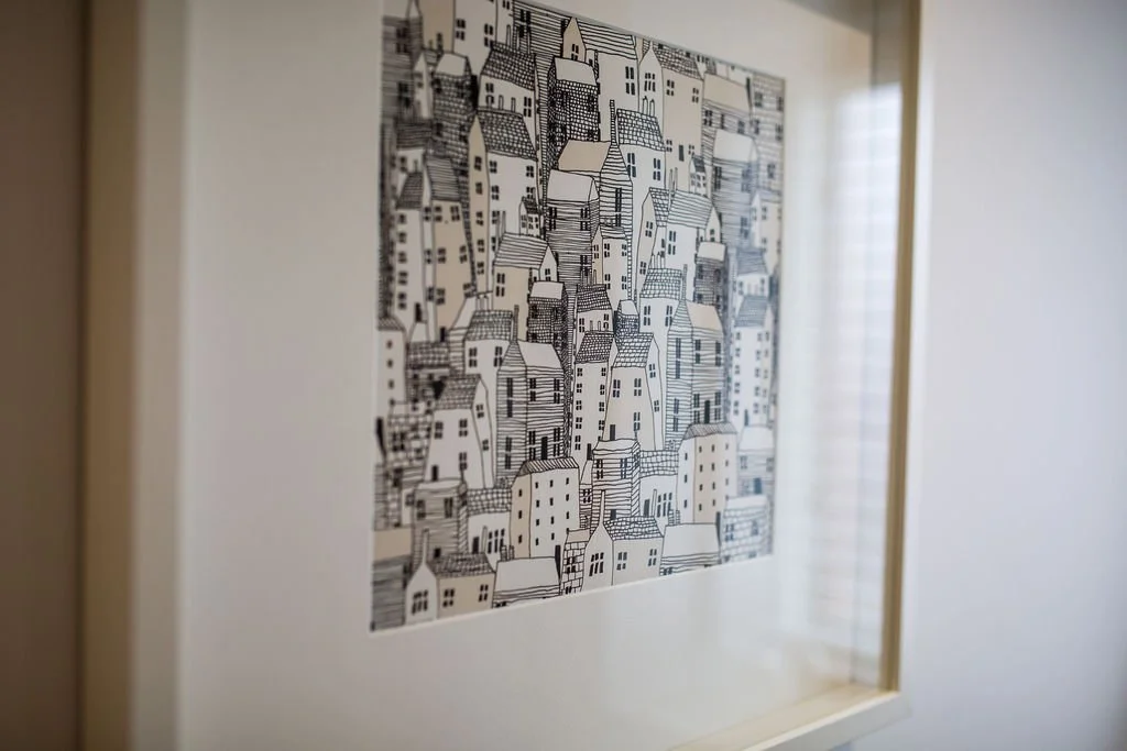 Contemporary show home artwork detail by Stiwdio Interior Design featuring monochrome architectural illustration, adding depth and character to modern property interiors.