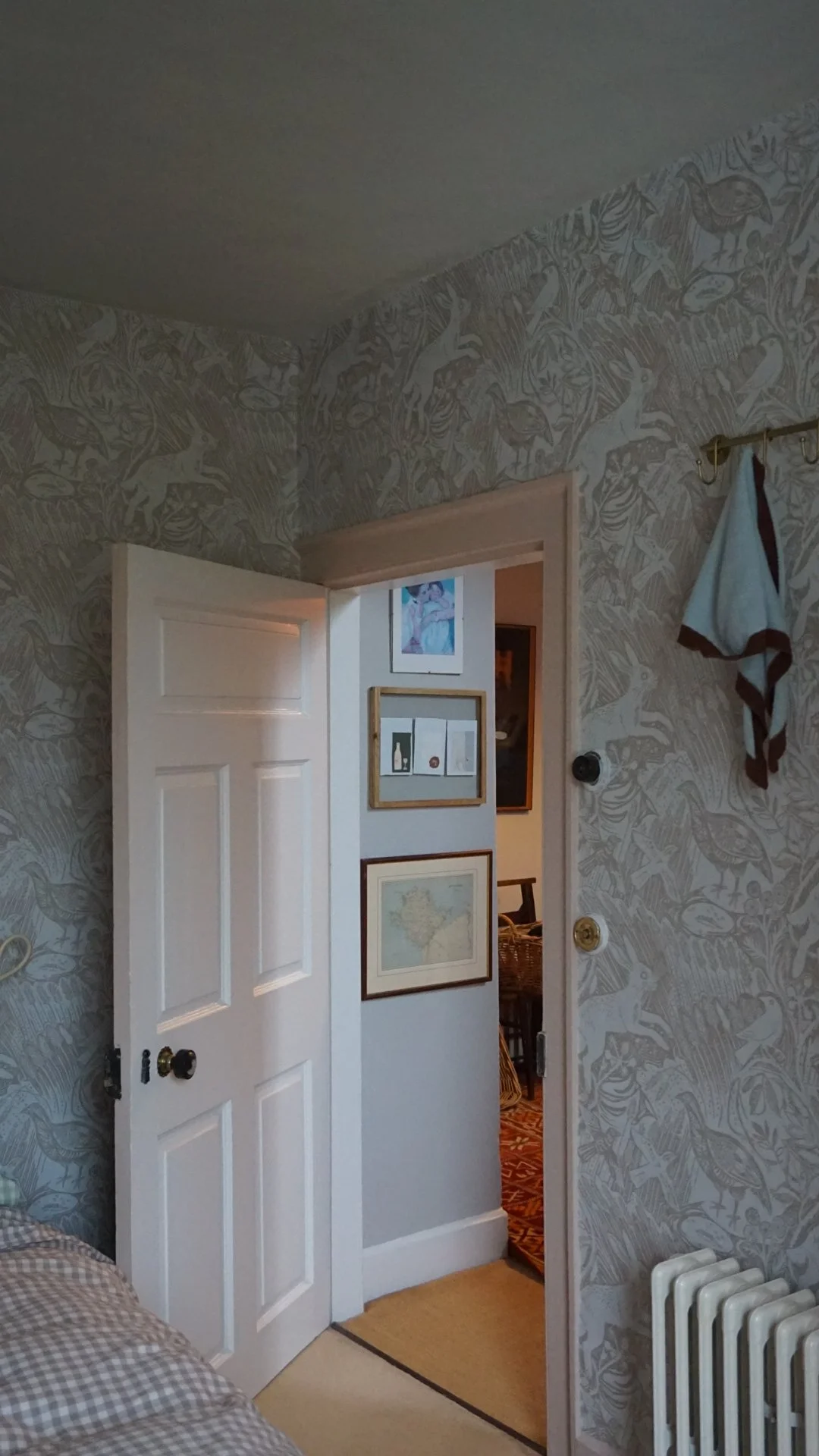 Anglesey country house refurbishment blending heritage architecture, bespoke wallpaper and layered interiors by Stiwdio Interior Design, North Wales.