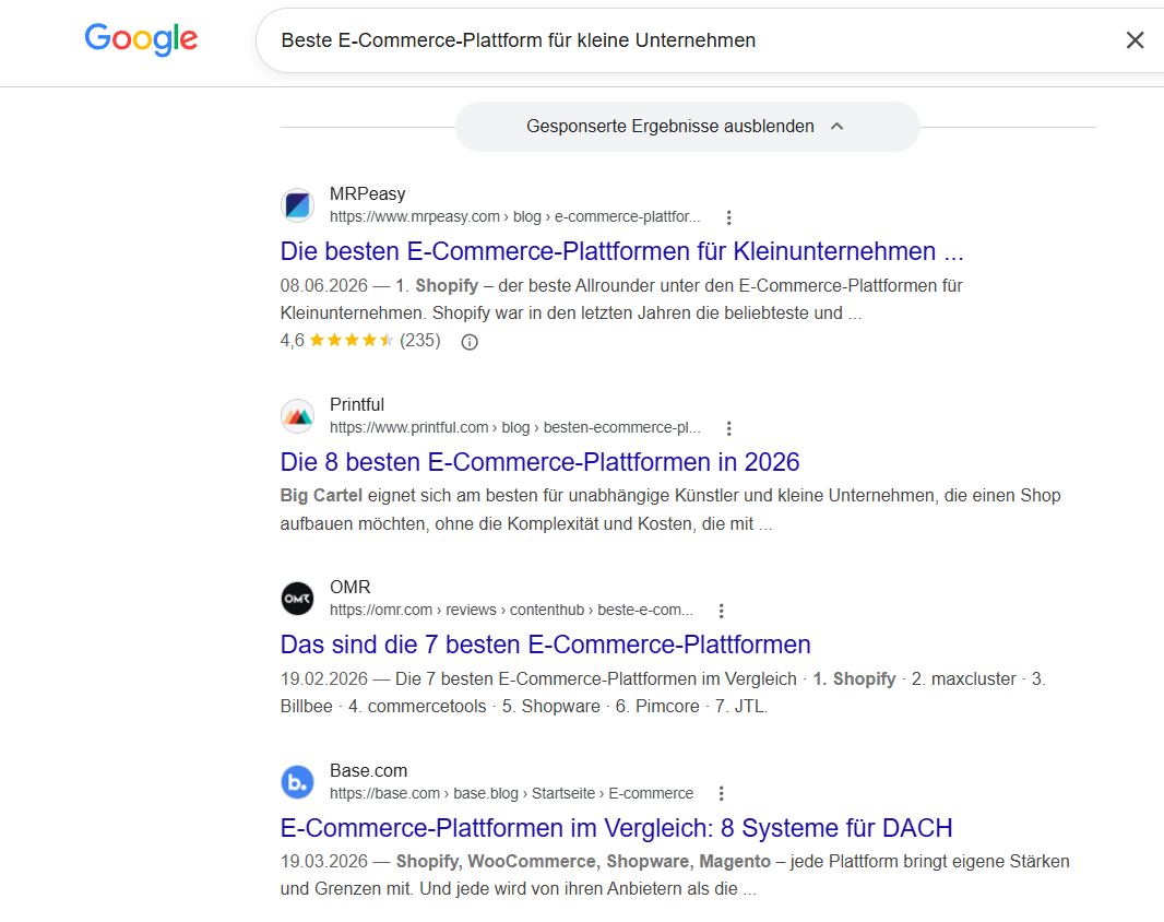 Google-Suchergebnisseite zur Anfrage „Beste E-Commerce-Plattform für kleine Unternehmen“ mit mehreren gesponserten Treffern.