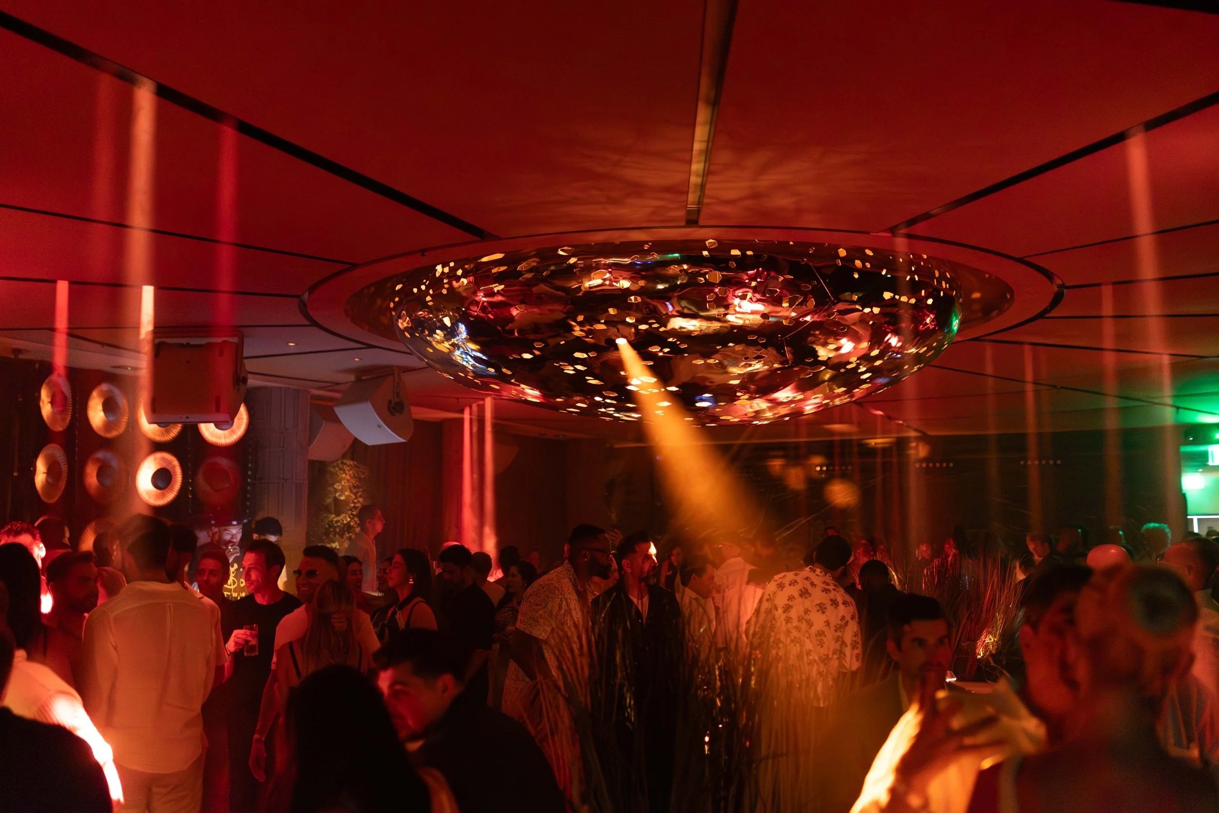 CASA NEOS Lounge with people interacting, dancing and celebrating.