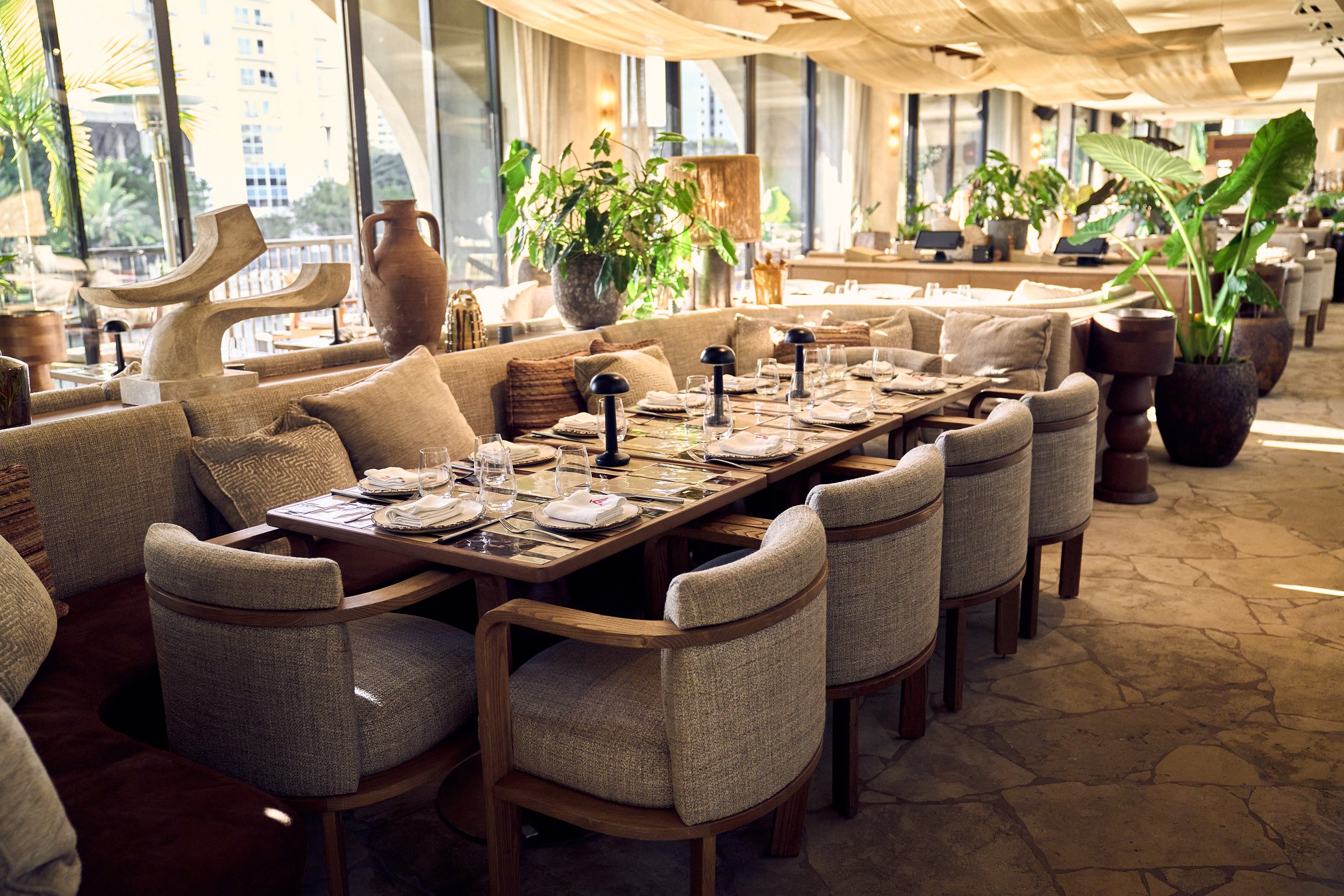 The second floor dining interior of CASA NEOS, with a comfortable area for a special event.