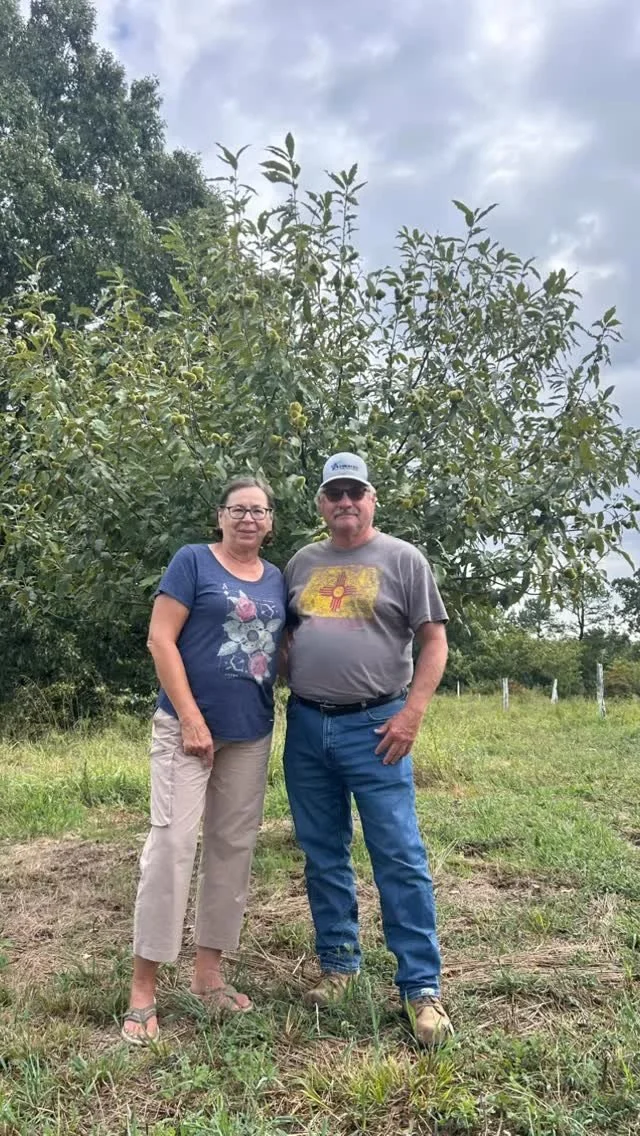 Joe and Mary drove all the way from West Branch, Iowa to pick up their 12 Ozark Chinquapin trees. They are standing in front of one of the mother trees on our farm. We definitely enjoyed visiting with them while they were here and wish them a safe t