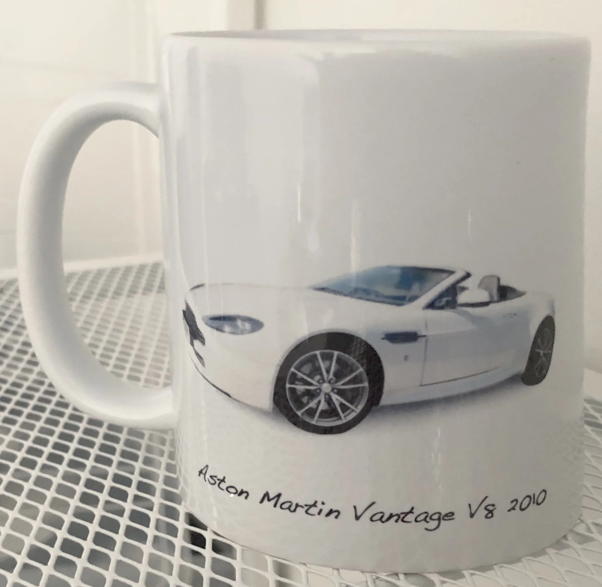 Aston Martin Vantage V8 2010 - LHS.jpg