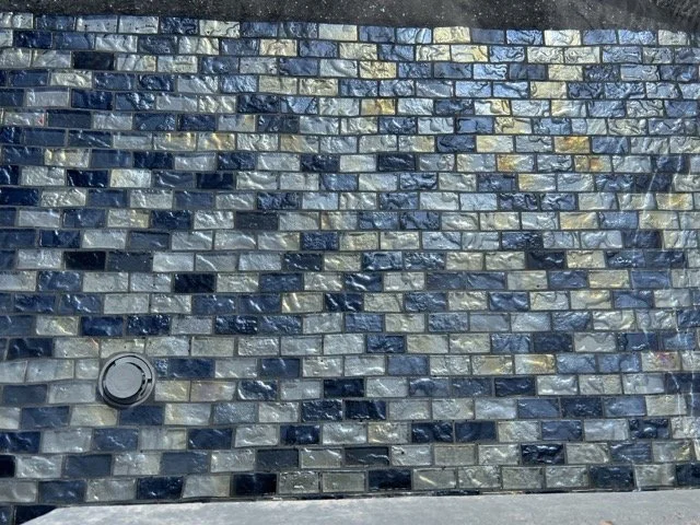 Mosaics shown in a Mercury Pools project
