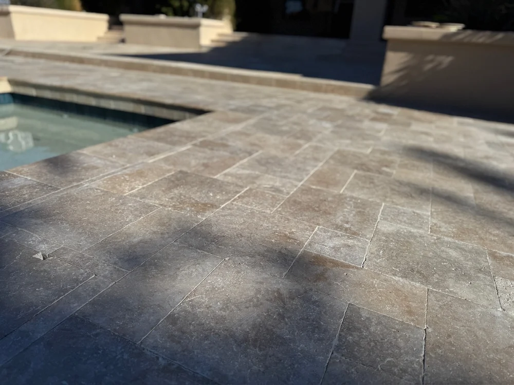 Close view of paver texture and coping