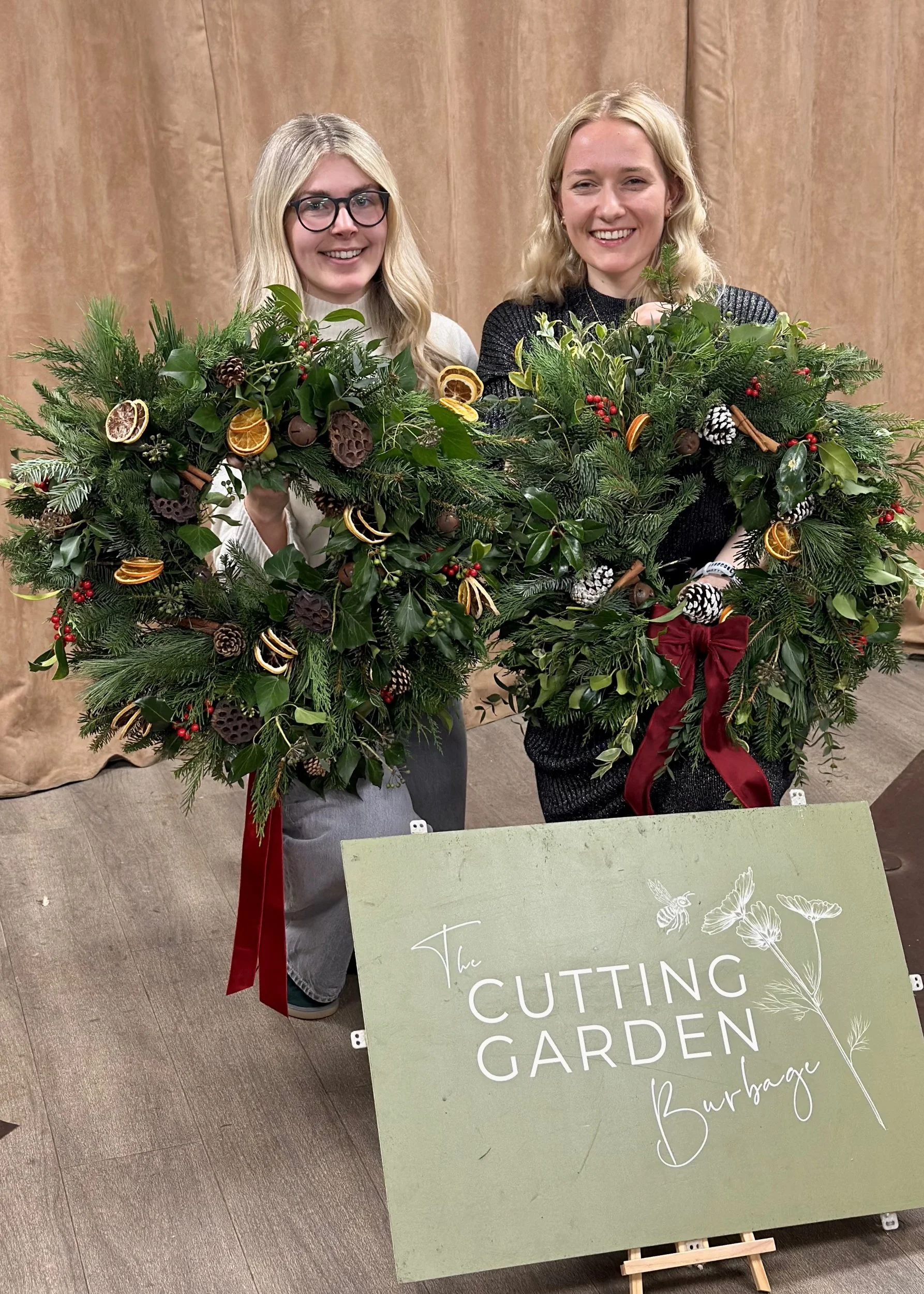 2x wreaths logo board.jpg