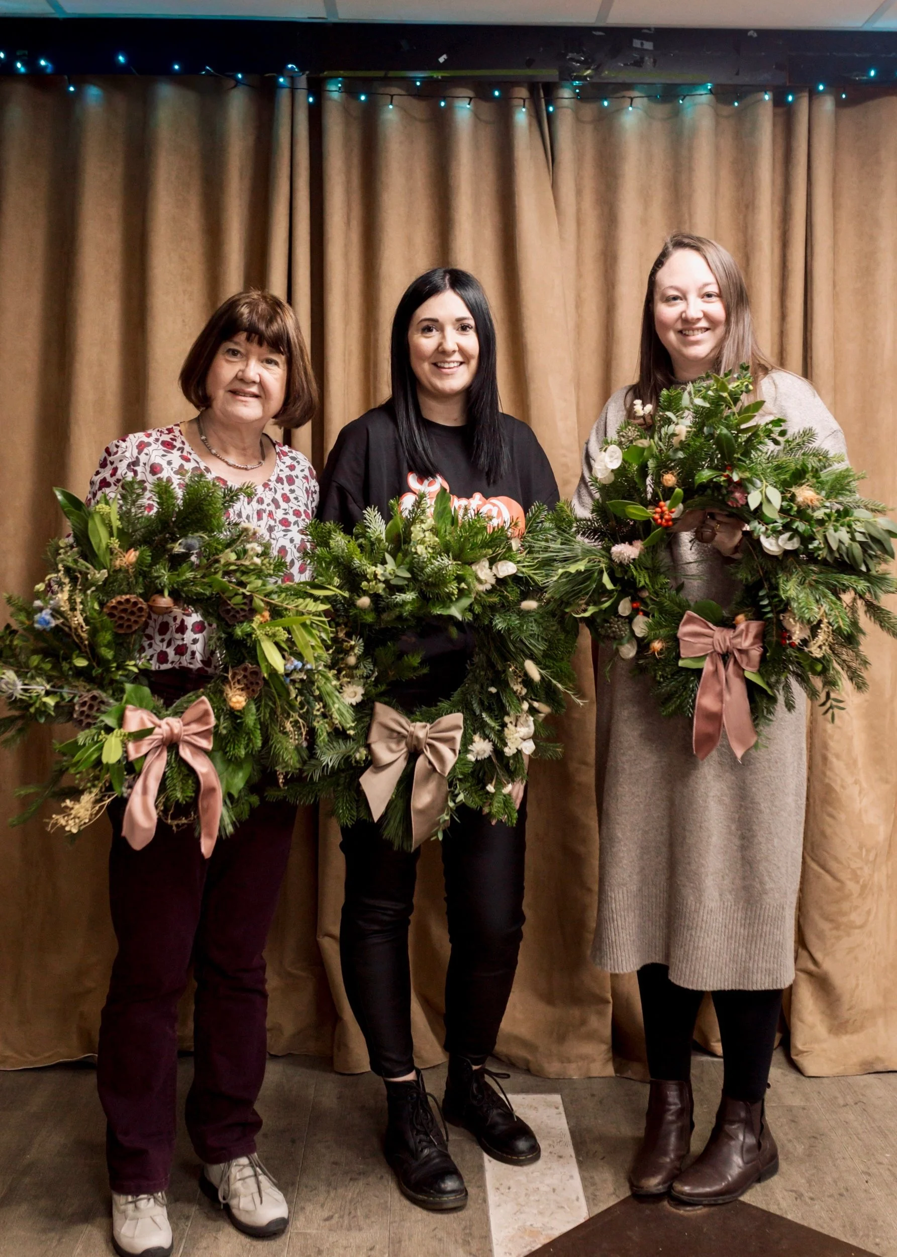 3 wreaths neautral bows.jpg