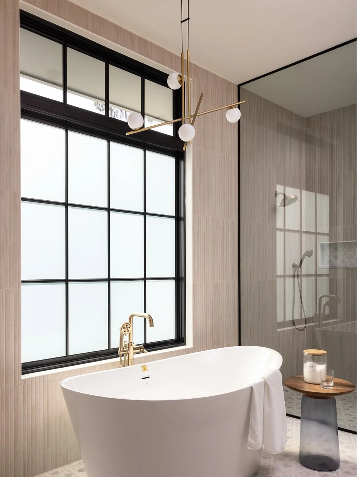 A sophisticated, modern bathroom with gold finishing touches!✨
Photo Creds: @mollyrose.photo 
.
.
.
#bath #bathroomdesign #bathroominspo #bathroomgoals #interiordesign #home #homebuilder #customhome #customhomes #customhomedesign #customhomebuilder