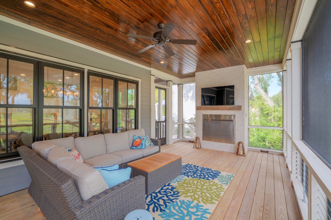 Screened In Porch with Couch and Outdoor TV