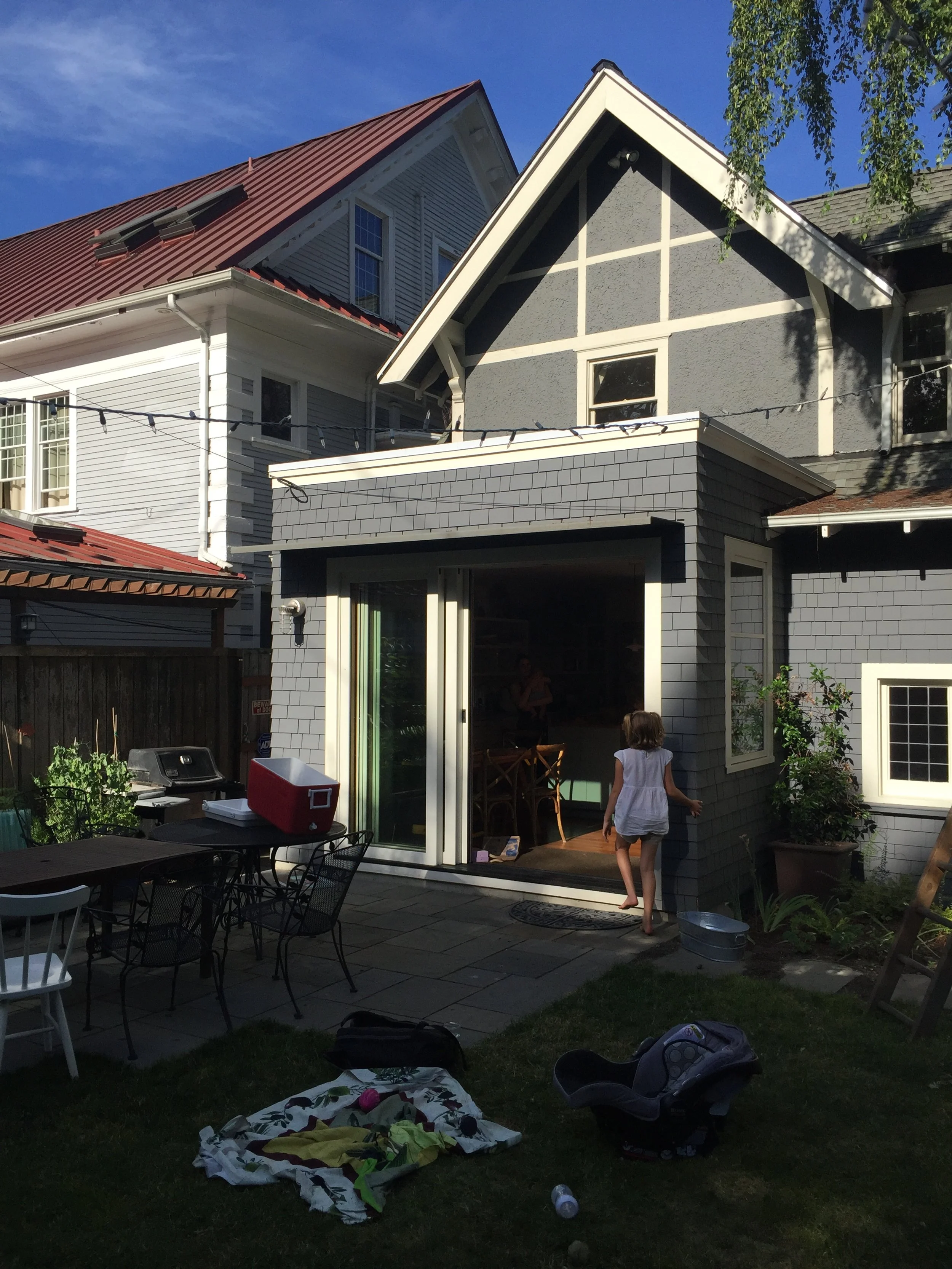  This project was a kitchen renovation for a family of 5, including a small addition to an existing stately home just south of Volunteer Park on Capitol Hill. The owners wanted a seamless indoor outdoor feel for the addition so large sliding doors we