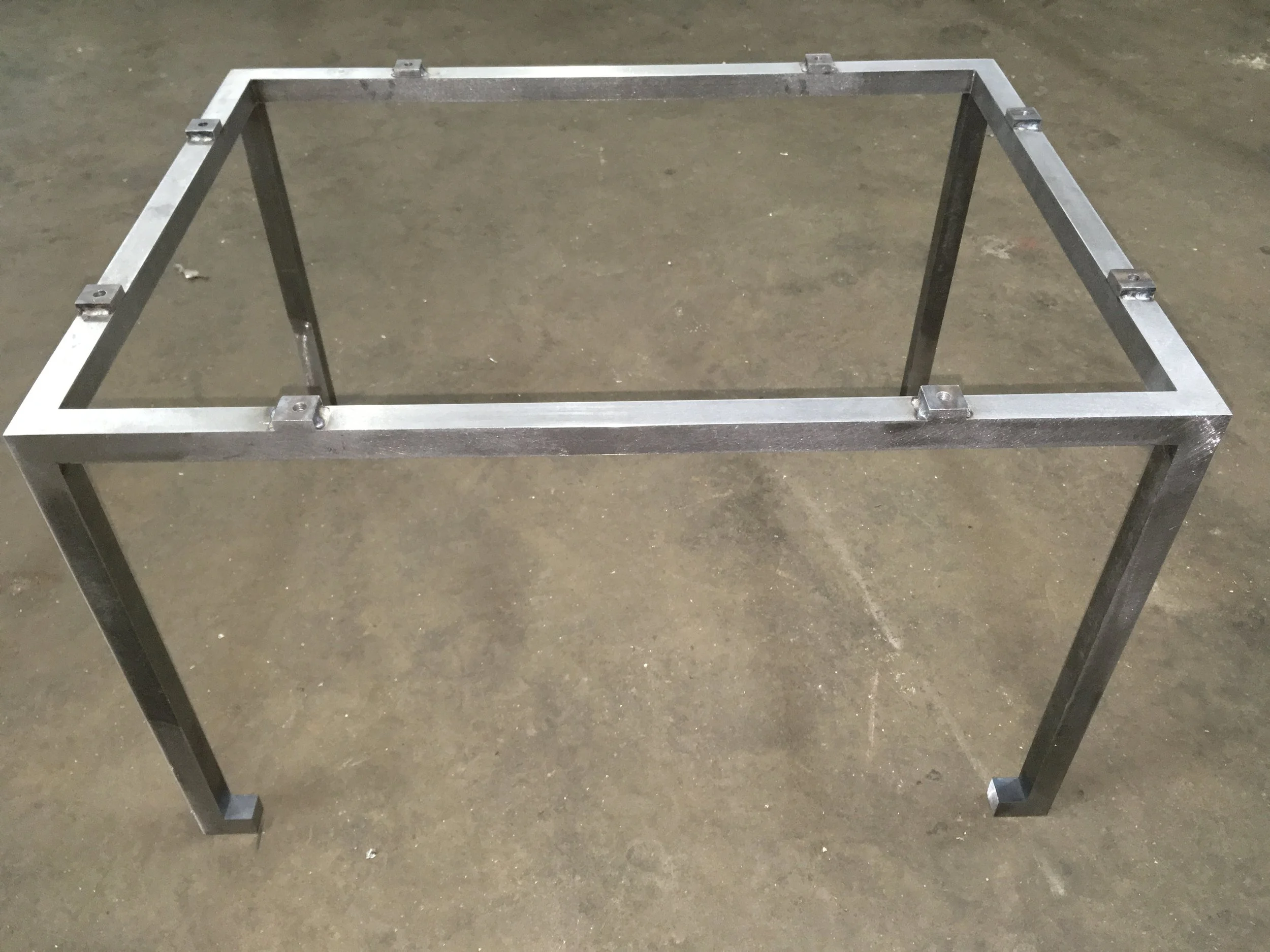 Custom steel table awaiting its top.