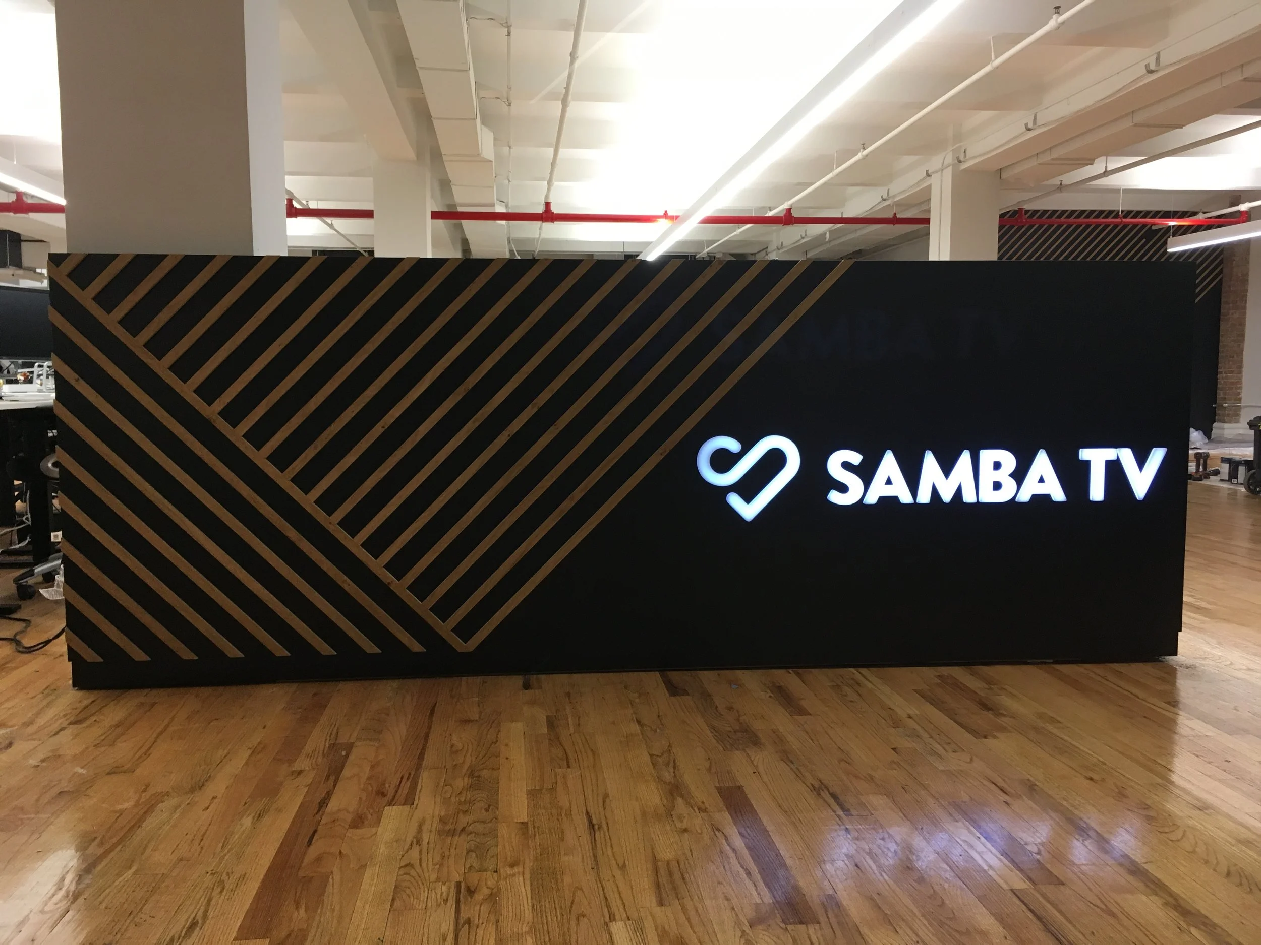 Custom light up reception desk. Assembled and installed with a team.