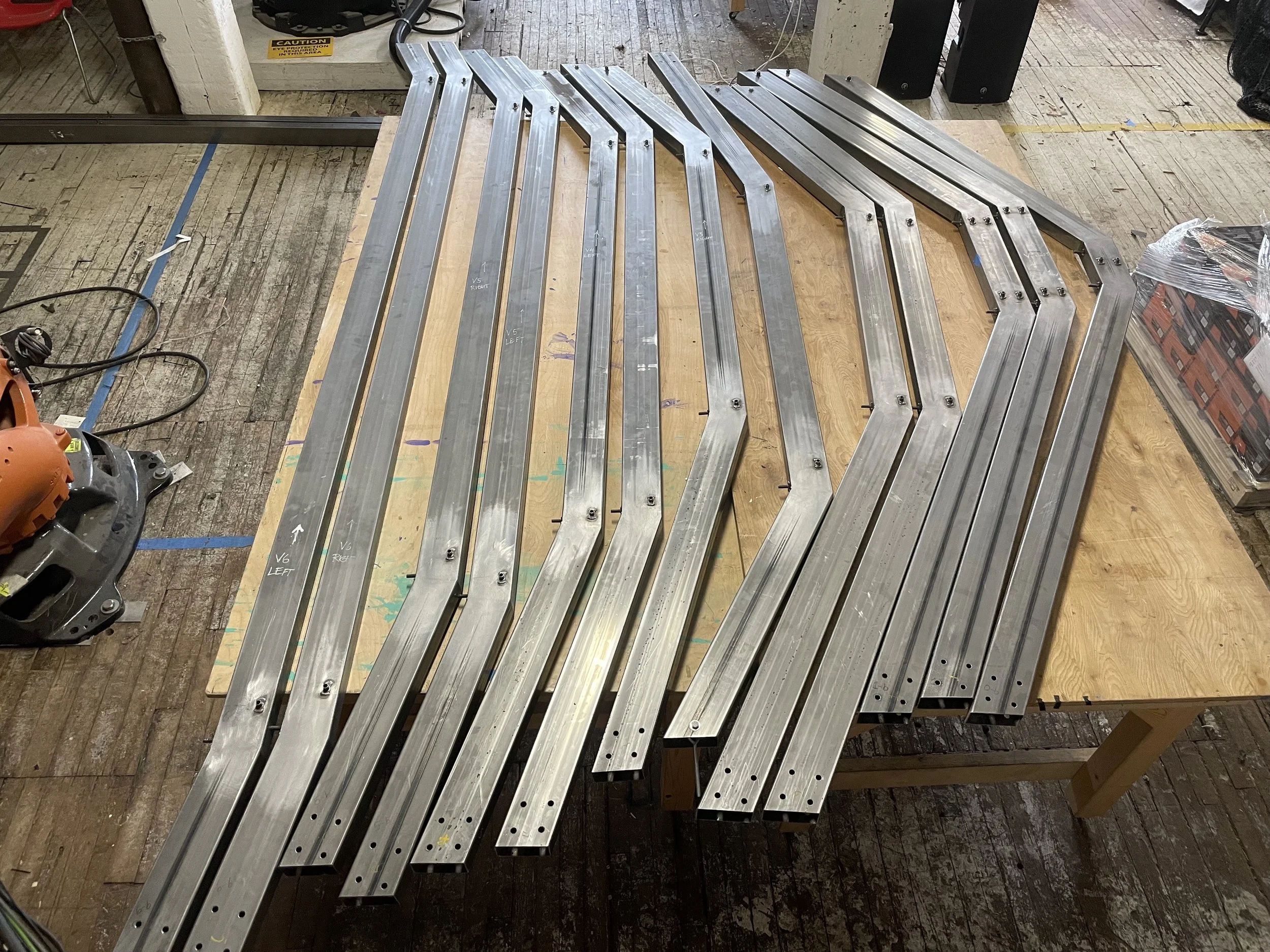 Steel support beams welded and fabricated to spec for a custom batting cage.