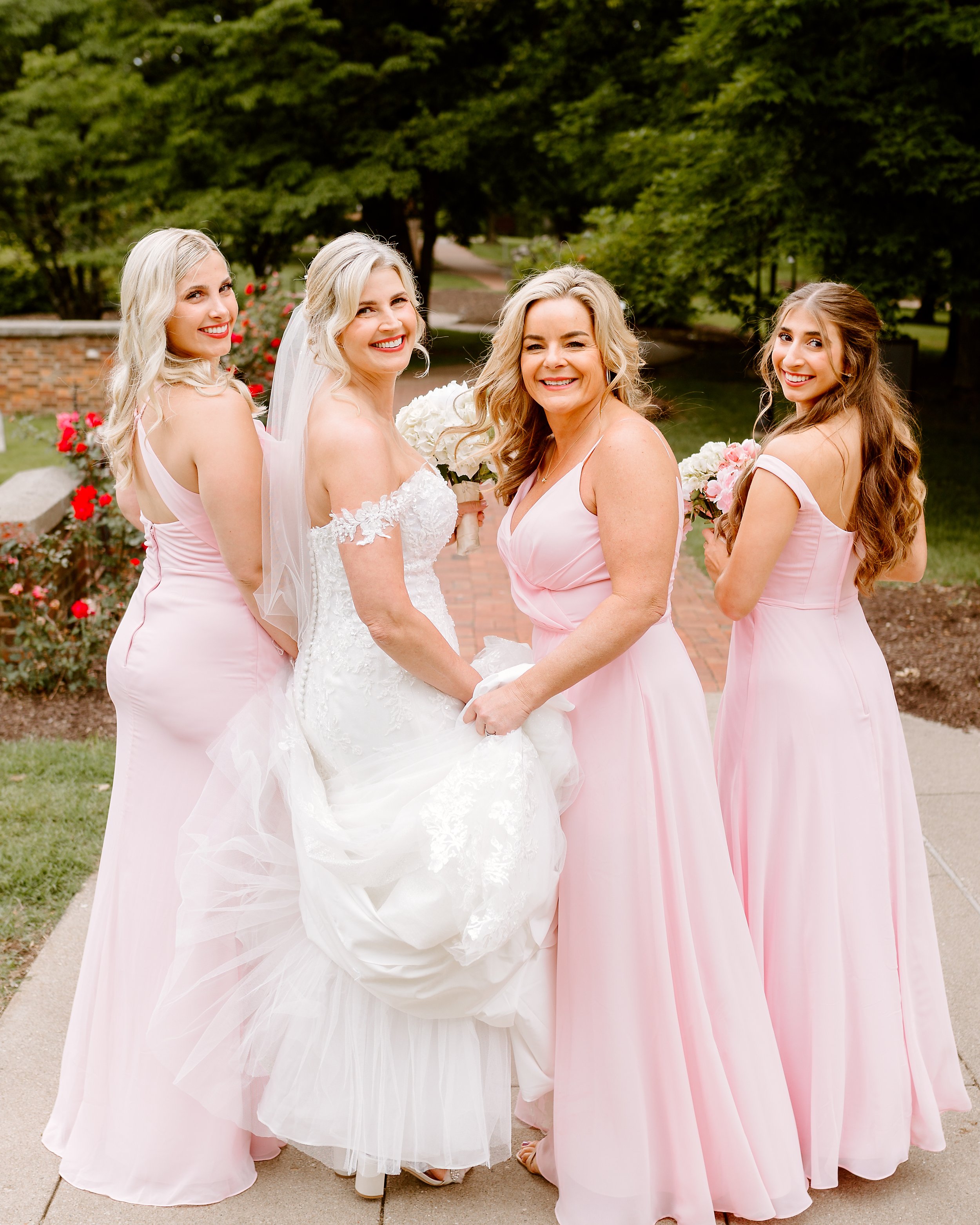 bride and her bridesmaids on her wedding day in bards town Kentucky