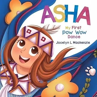Book cover titled 'ASHA: My First Pow Wow Dance' featuring an illustrated girl with long brown hair, a feathered headdress, and a traditional outfit, surrounded by colorful flowers and decorative elements.