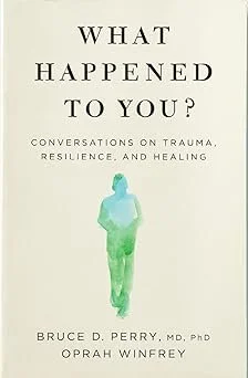 Book cover titled 'What Happened to You? Conversations on Trauma, Resilience, and Healing' by Bruce D. Perry and Oprah Winfrey, featuring a watercolor silhouette of a person in shades of blue and green.