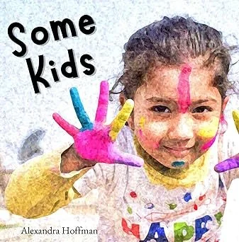 A girl with painted hands and face smiling, with the text "Some Kids" and "HAPPY" written on her shirt.