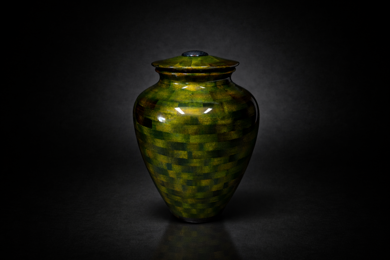 Green urn charcoal background.png