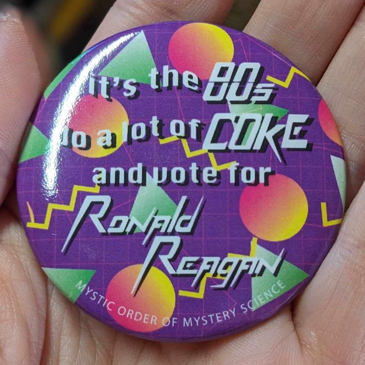 Eighties-inspired pin design for a New Orleans sub-krewe of the Krewe of Chewbacchus. The client's instruction was to make it look "as cheesy as possible."
