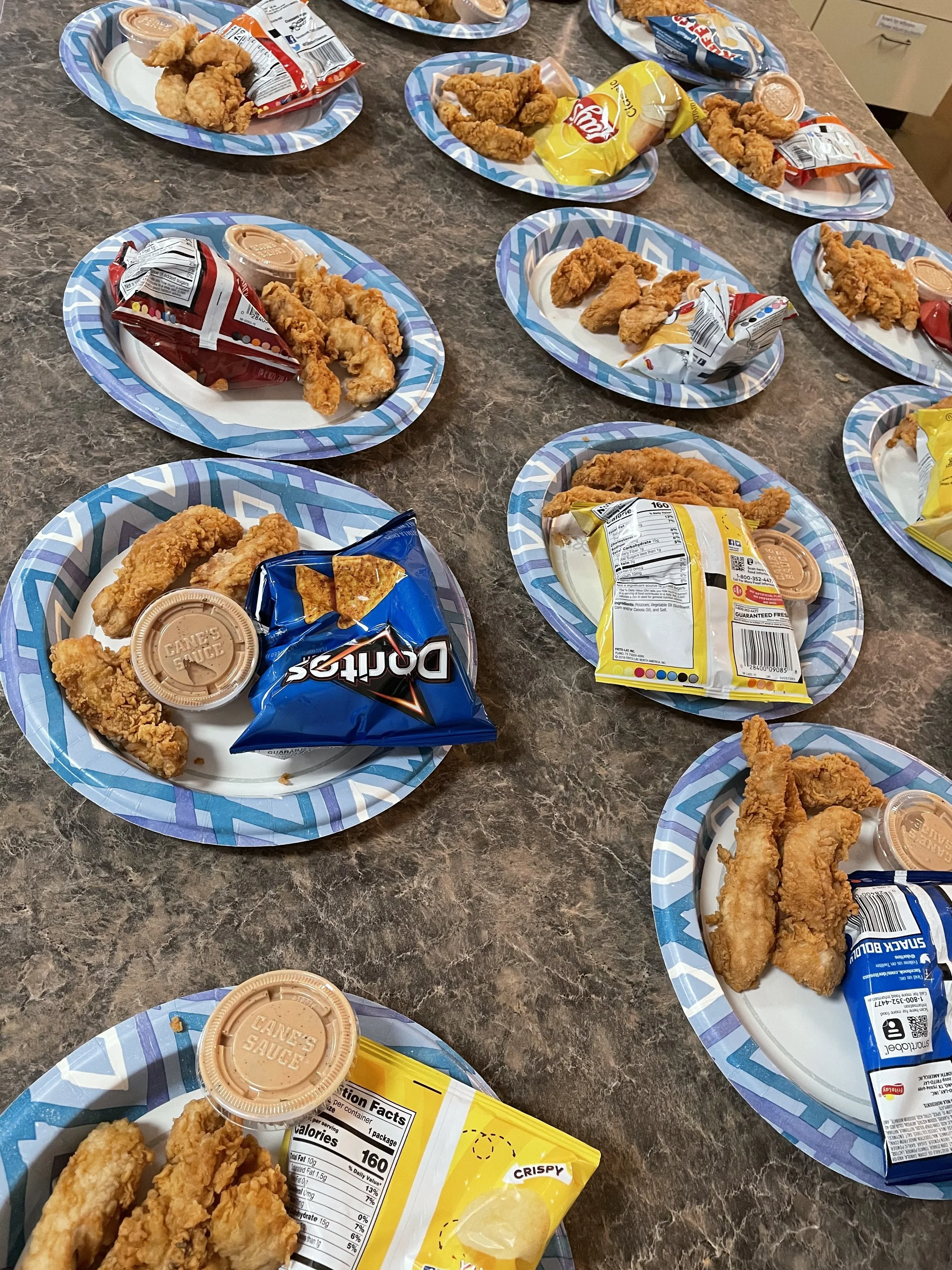 Roots students were provided with dinner after every practice, donated by various restaurants and organizations. This dinner was courtesy of Raising Cane's.