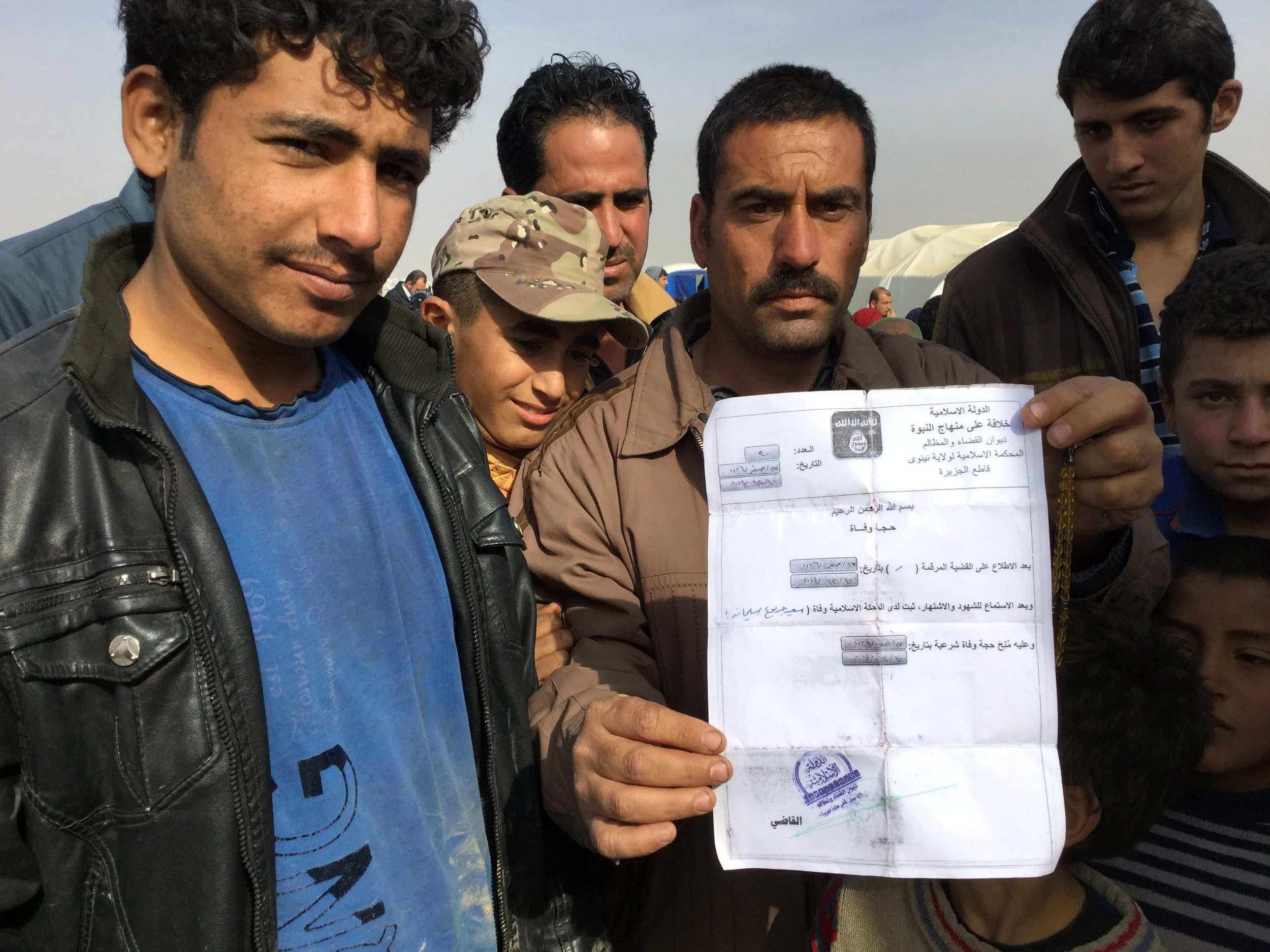 'We were all prisoners; now, we are free': Iraqis fleeing Mosul find safety in camps