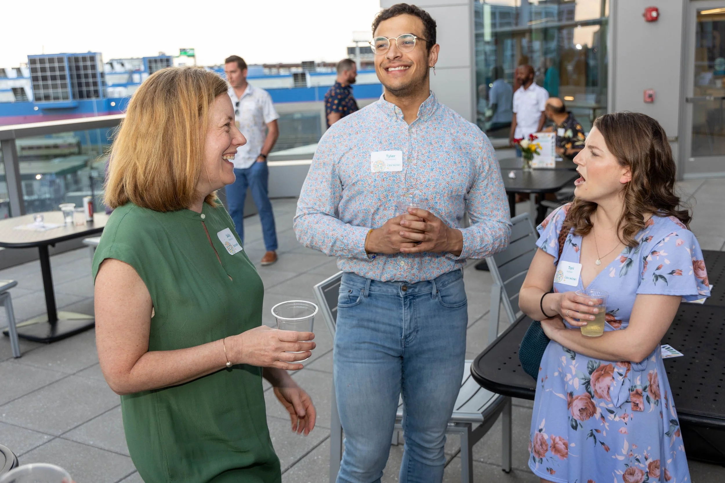 L–R: CSV Manager of Elementary Literacy Sally Peterson; Tyler Nicholson, senior research associate at BioNTech; and volunteer Reading Buddy Tori Kohler, team leader of translational immunology at BioNTech