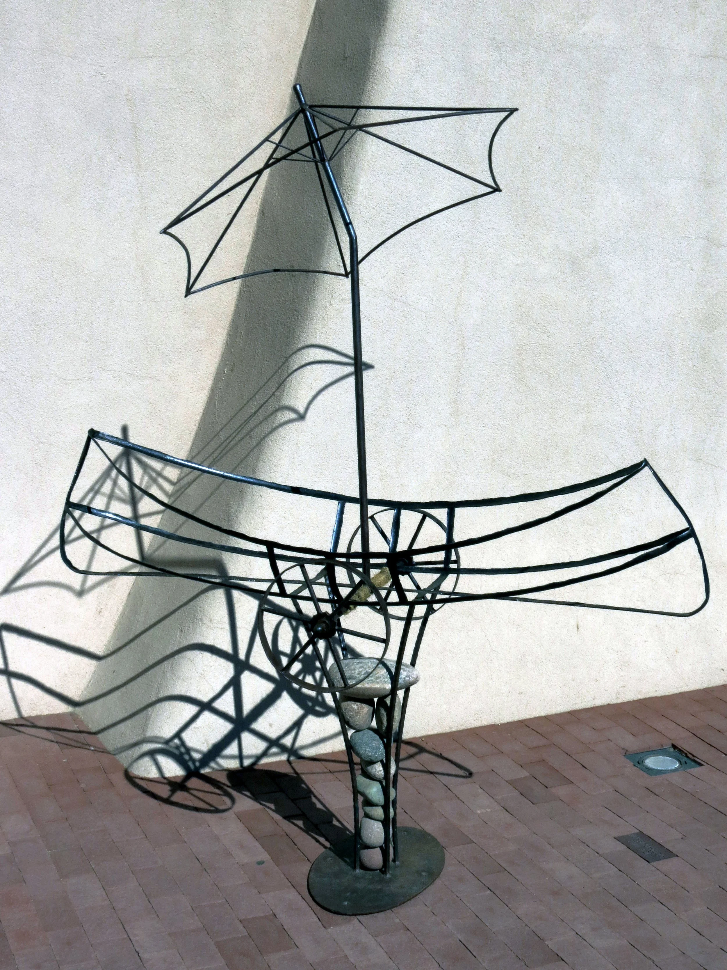 Pirogue with Wheels and Parasol