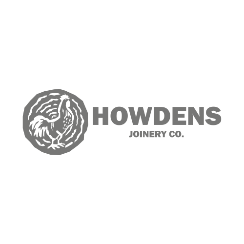 Logo for Howdens Joinery Company featuring a circular emblem with a lion's head and the text 'HOWDENS JOINERY CO.'