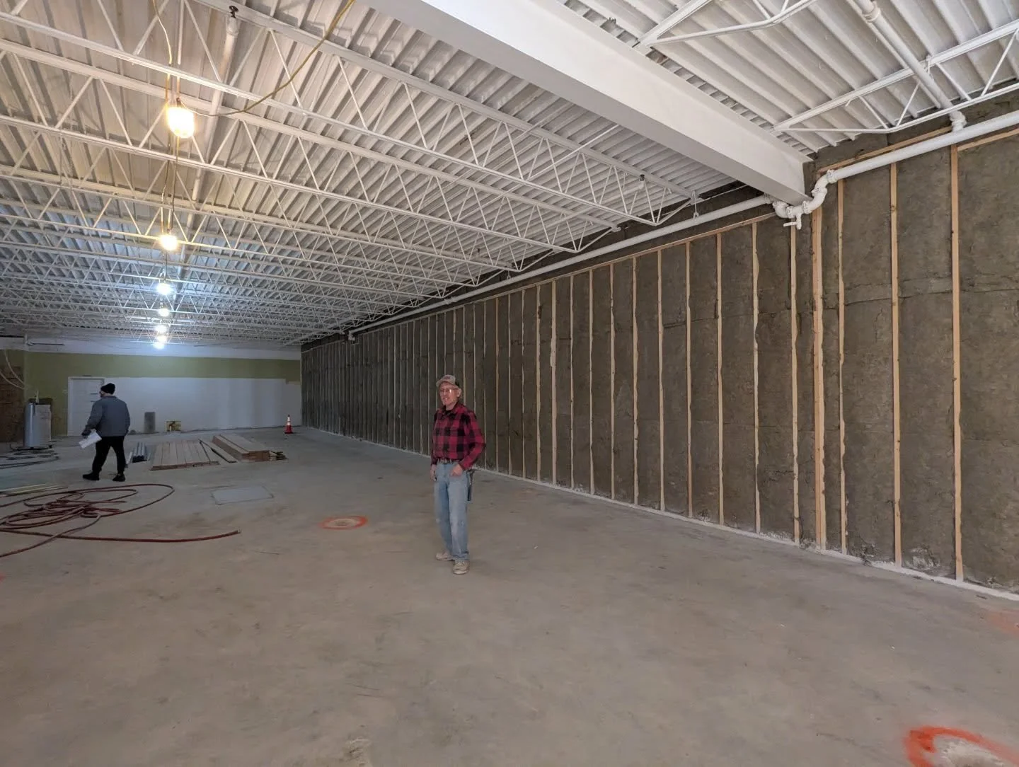 Project construction update @burnbootcampcedarburgwi ! Rockwool @rockwoolna insulation is in the party wall, underground plumbing is done with new slab poured, sprinklers adjusted, framing is starting, HVAC starting soon