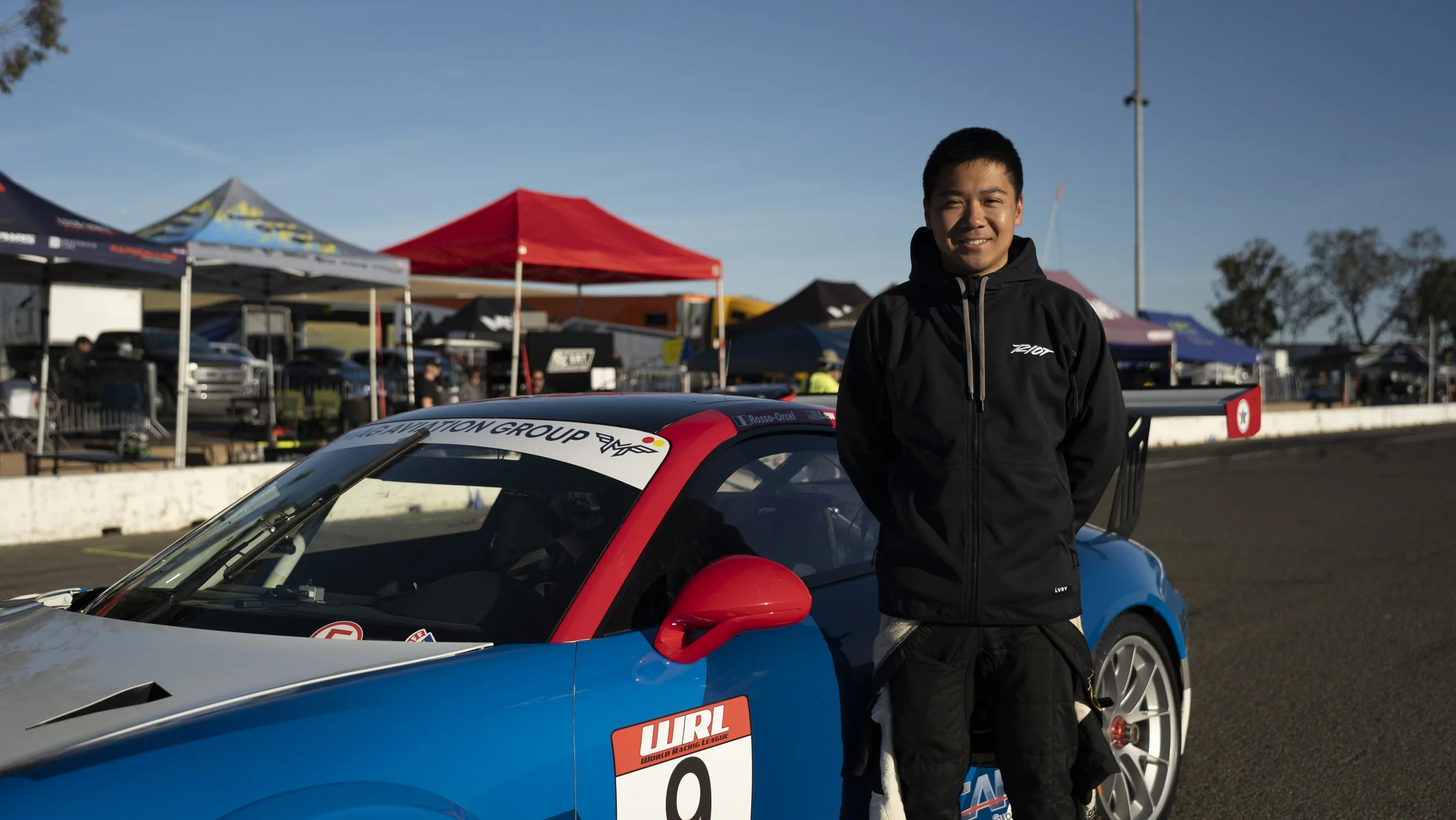Bryson Lew on the grid prior to the WRL Thunderhill race, Porsche 991.2 GT3 Cup racing