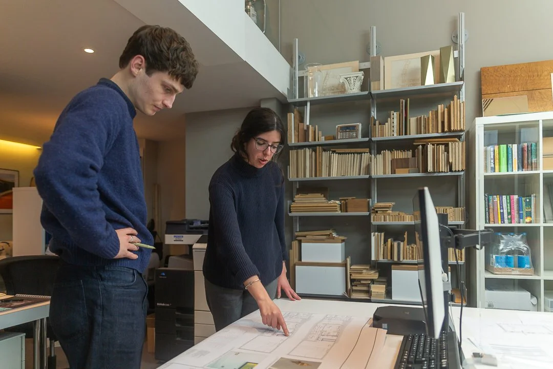 The JLE Studio team planning building details
