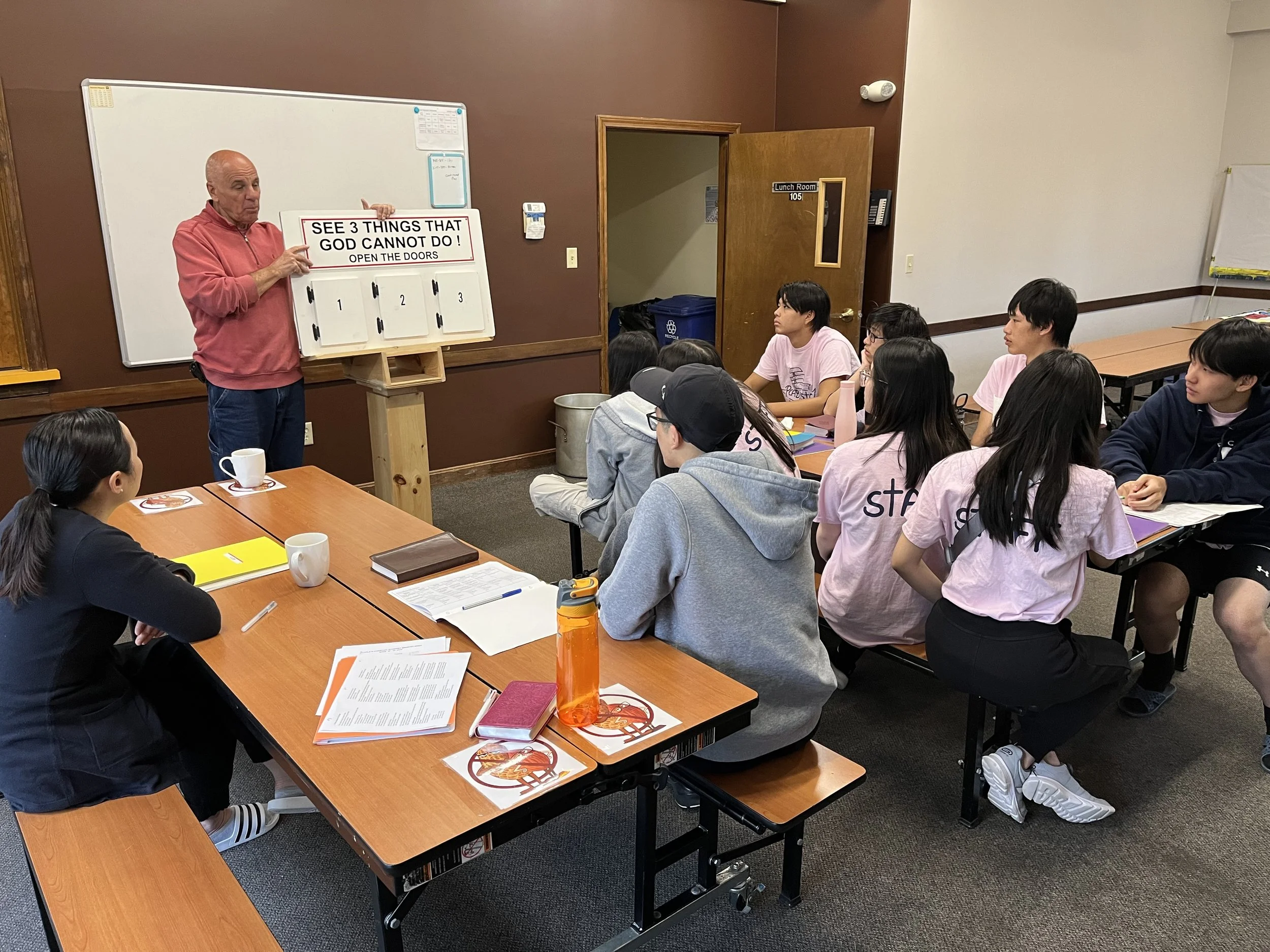 Day 2 - Mission team members receive training with host Eric at Open Air Campaigners
