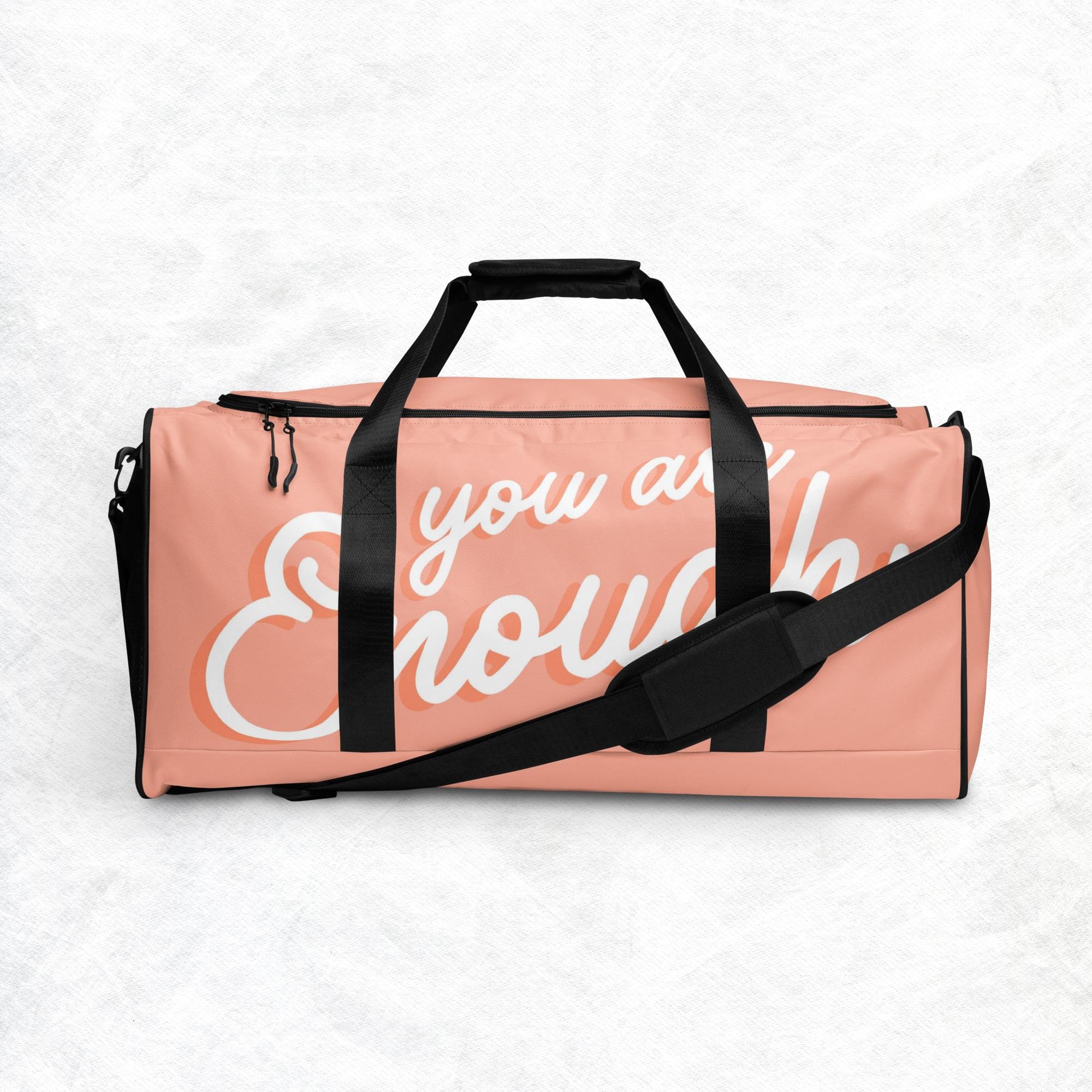all-over-print-duffle-bag-white-front-67c7ad9bd1bad.jpg