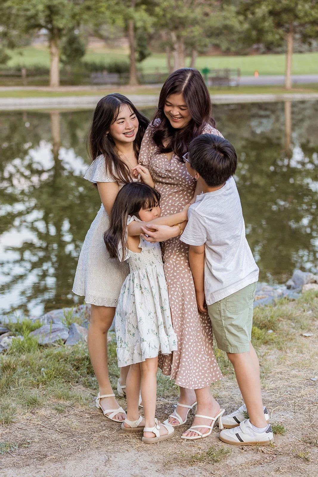 Best Highlands Ranch family photographer capturing natural candid moments at Hudson Gardens.