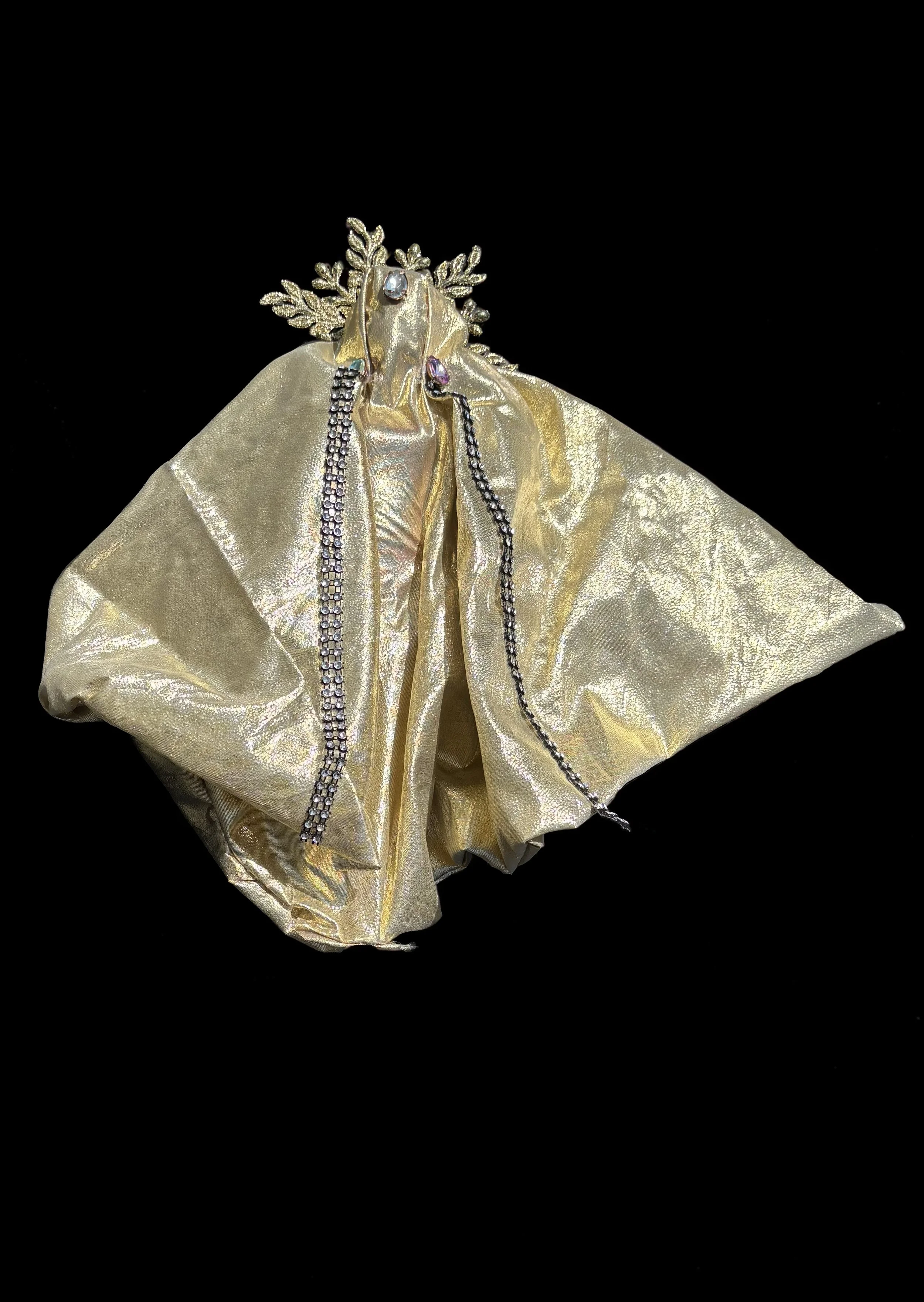  Ascension Spirit   
Soft Sculpture 
 Found Materials   
Discarded Doll, Fabric,  
Found Natural Materials,  
Costume Jewelry, Plastic Gems