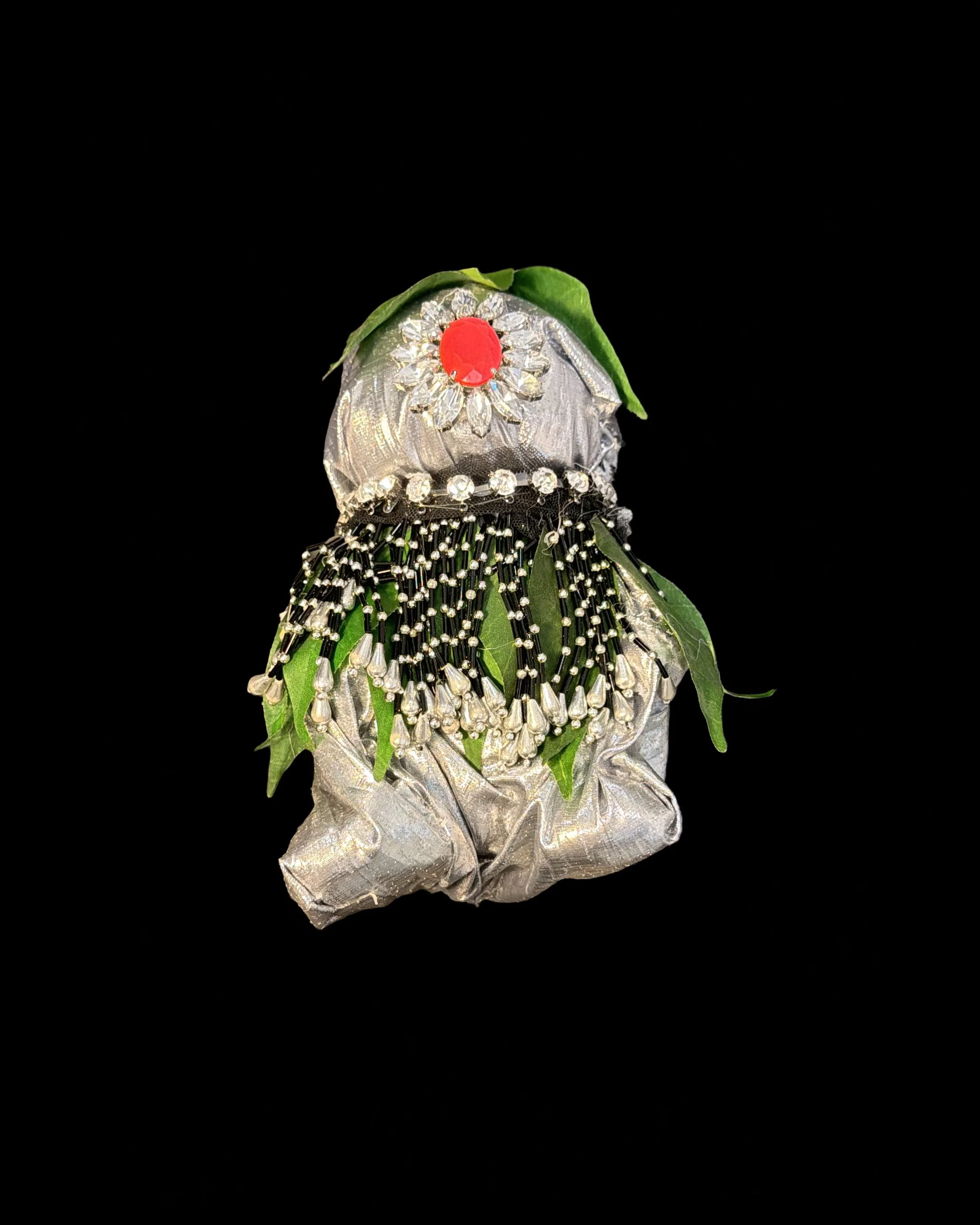  Ascension Spirit   
Soft Sculpture 
 Found Materials   
Discarded Doll, Fabric,  
Found Natural Materials,  
Costume Jewelry, Plastic Gems