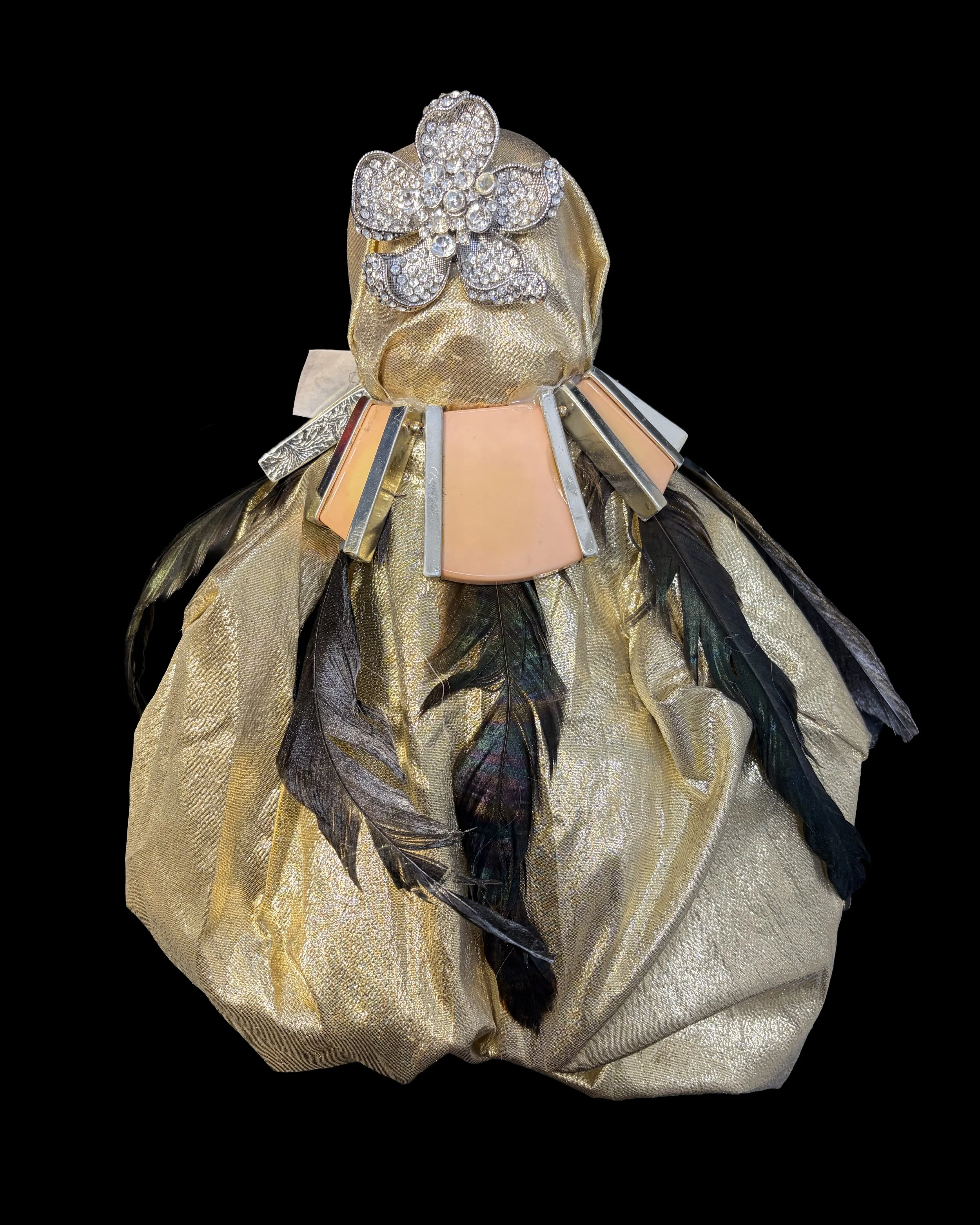  Ascension Spirit   
Soft Sculpture 
 Found Materials   
Discarded Doll, Fabric,  
Found Natural Materials,  
Costume Jewelry, Plastic Gems