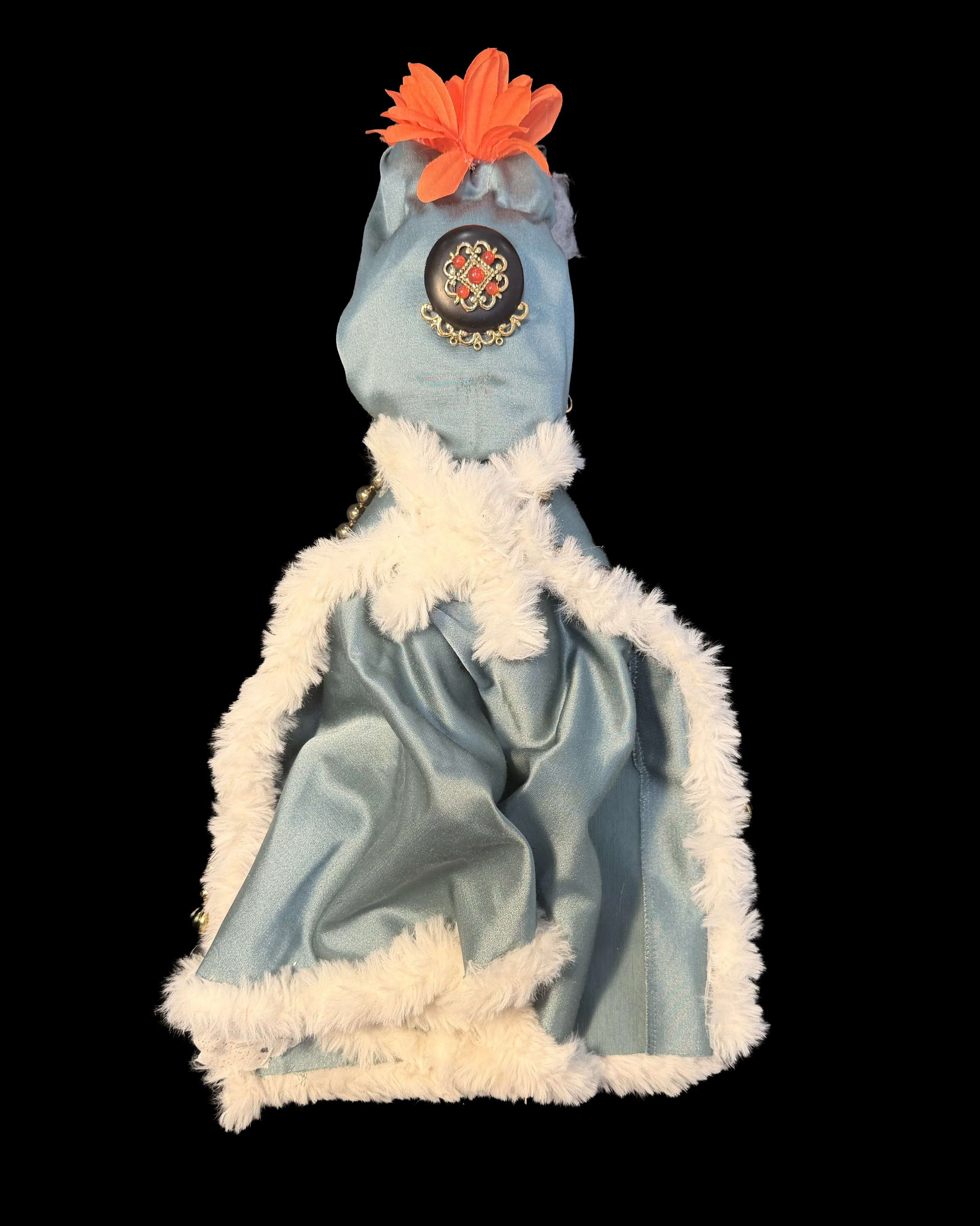  Ascension Spirit   
Soft Sculpture 
 Found Materials   
Discarded Doll, Fabric,  
Found Natural Materials,  
Costume Jewelry, Plastic Gems
