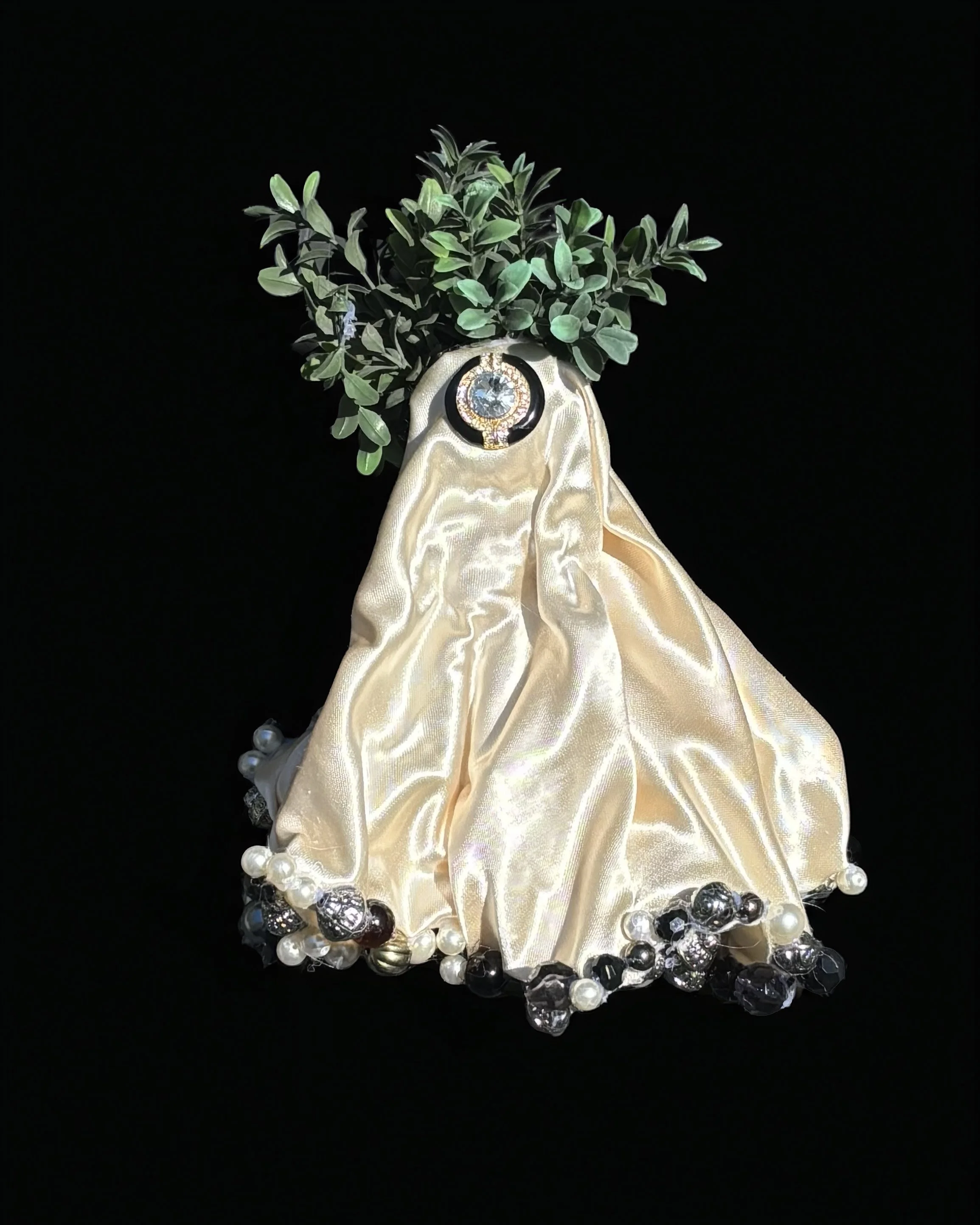  Ascension Spirit   
Soft Sculpture 
 Found Materials   
Discarded Doll, Fabric,  
Found Natural Materials,  
Costume Jewelry, Plastic Gems