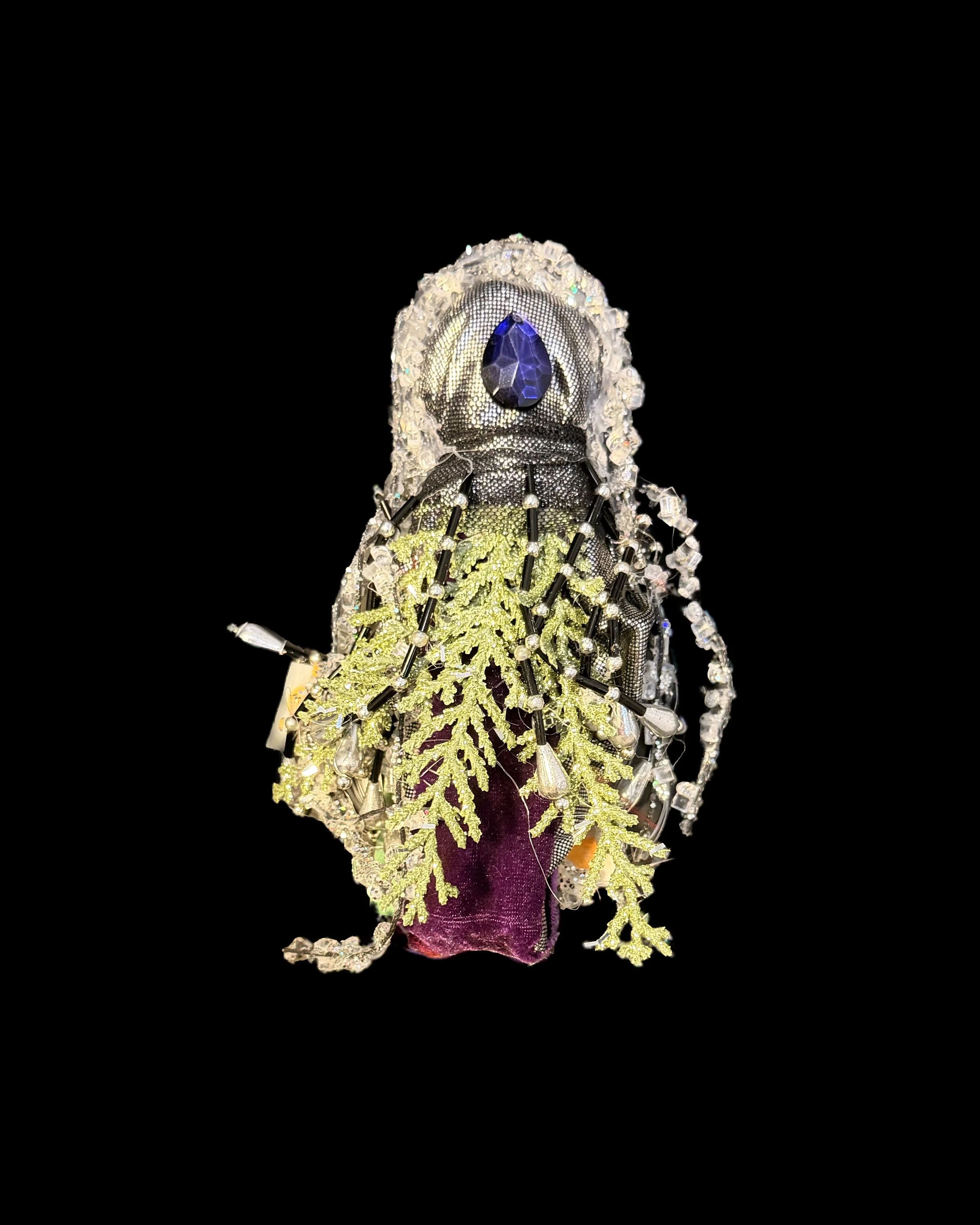  Ascension Spirit   
Soft Sculpture 
 Found Materials   
Discarded Doll, Fabric,  
Found Natural Materials,  
Costume Jewelry, Plastic Gems