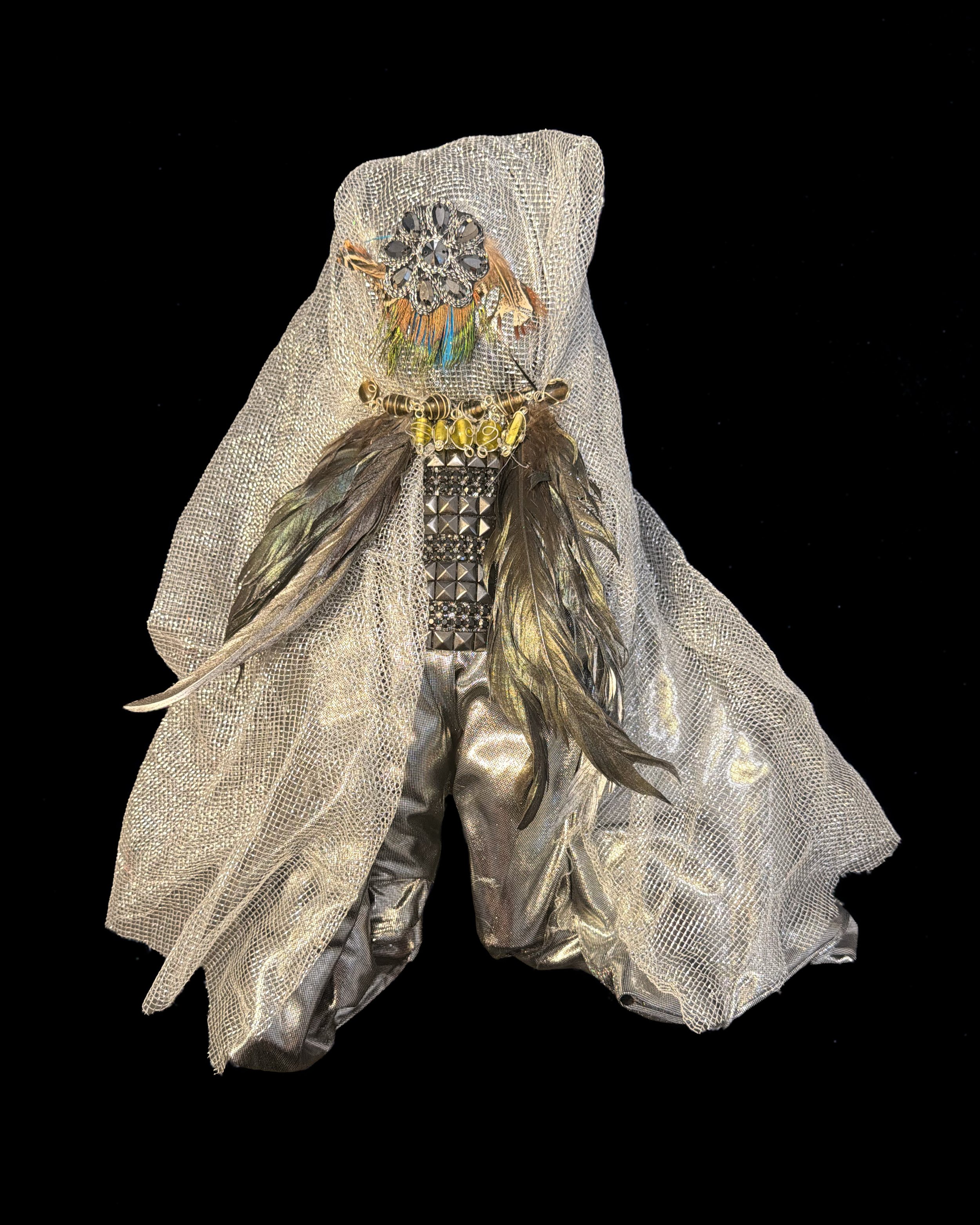  Ascension Spirit   
Soft Sculpture 
 Found Materials   
Discarded Doll, Fabric,  
Found Natural Materials,  
Costume Jewelry, Plastic Gems