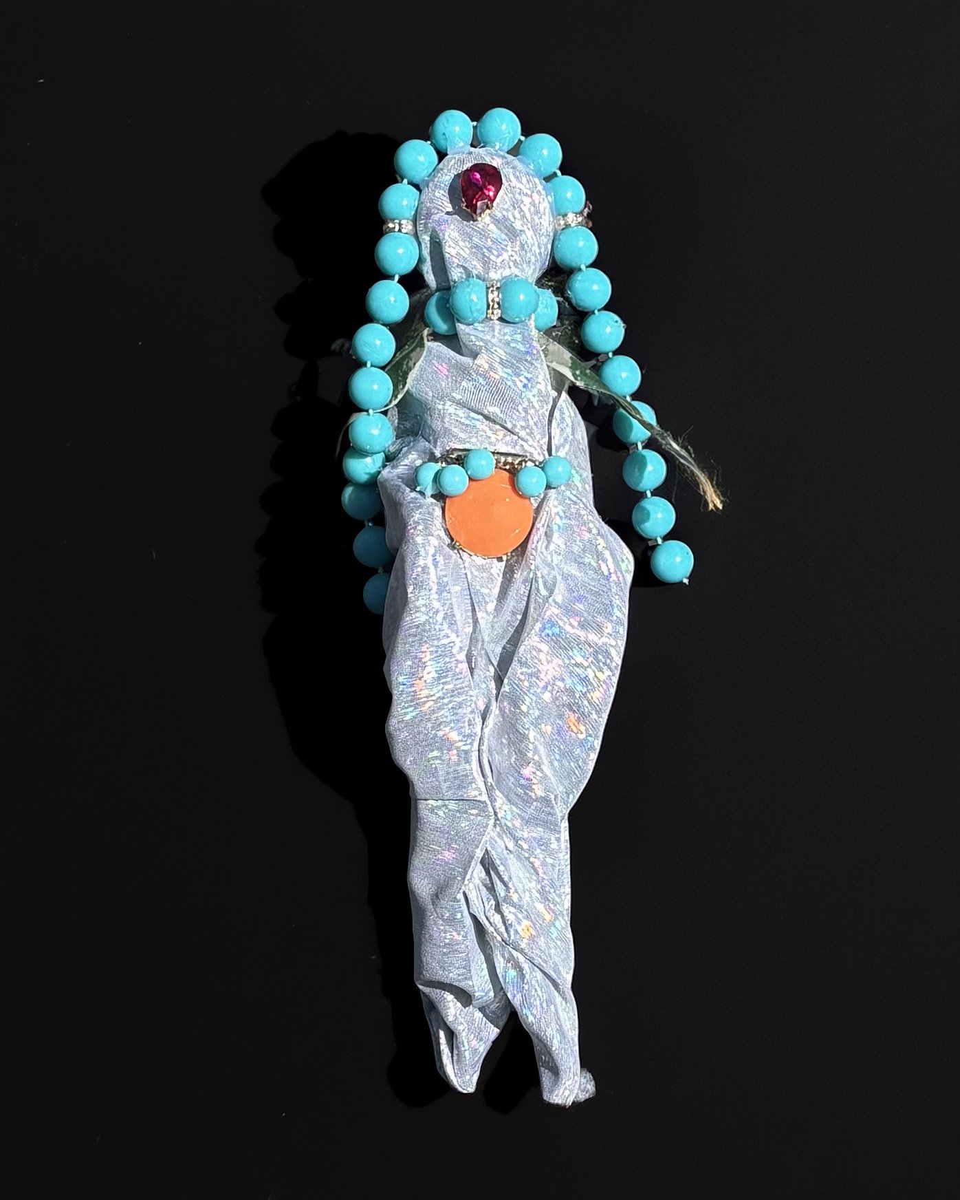  Ascension Spirit   
Soft Sculpture 
 Found Materials   
Discarded Doll, Fabric,  
Found Natural Materials,  
Costume Jewelry, Plastic Gems