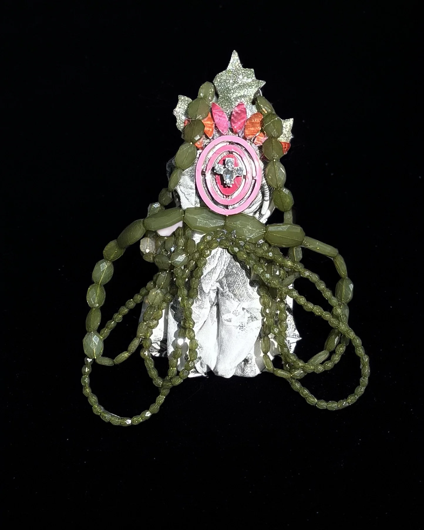  Ascension Spirit   
Soft Sculpture 
 Found Materials   
Discarded Doll, Fabric,  
Found Natural Materials,  
Costume Jewelry, Plastic Gems
