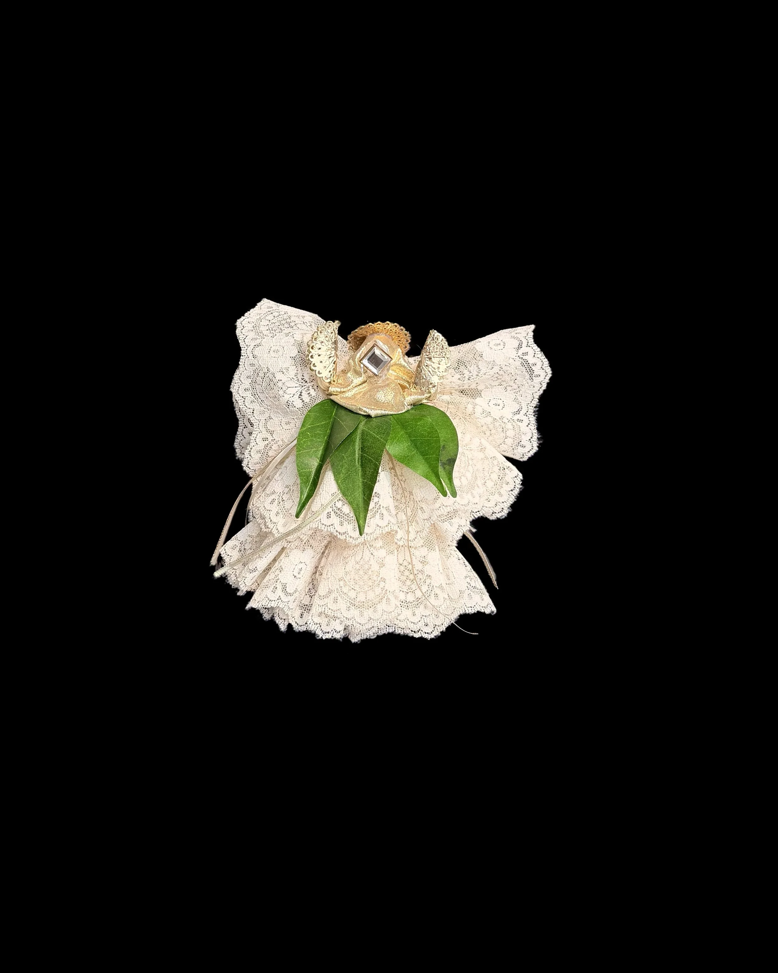  Ascension Spirit   
Soft Sculpture 
 Found Materials   
Discarded Doll, Fabric,  
Found Natural Materials,  
Costume Jewelry, Plastic Gems